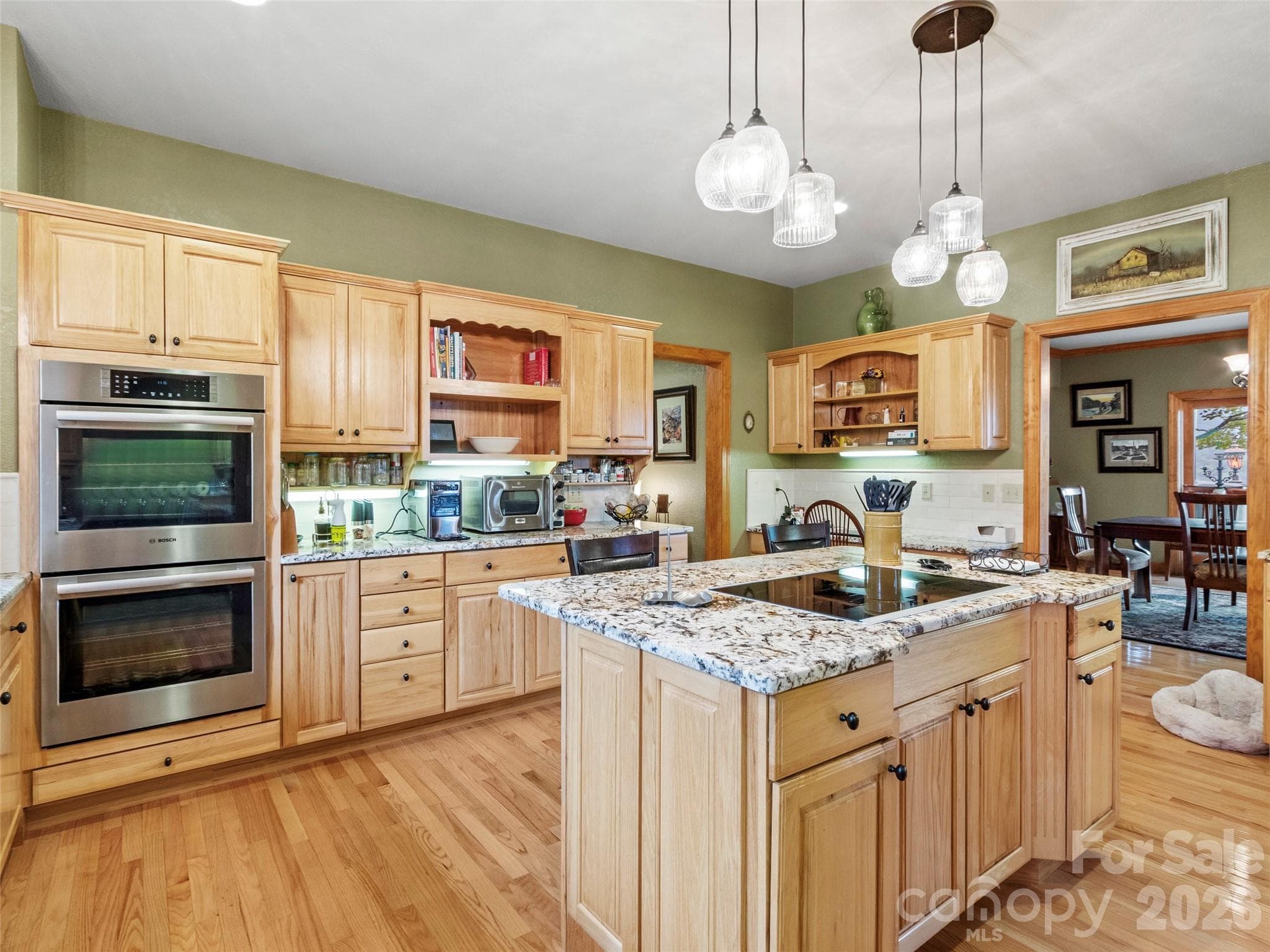 Natural light & warm wood cabinetry makes this an inviting space - 151 Austin Mountain Drive, Burnsville
