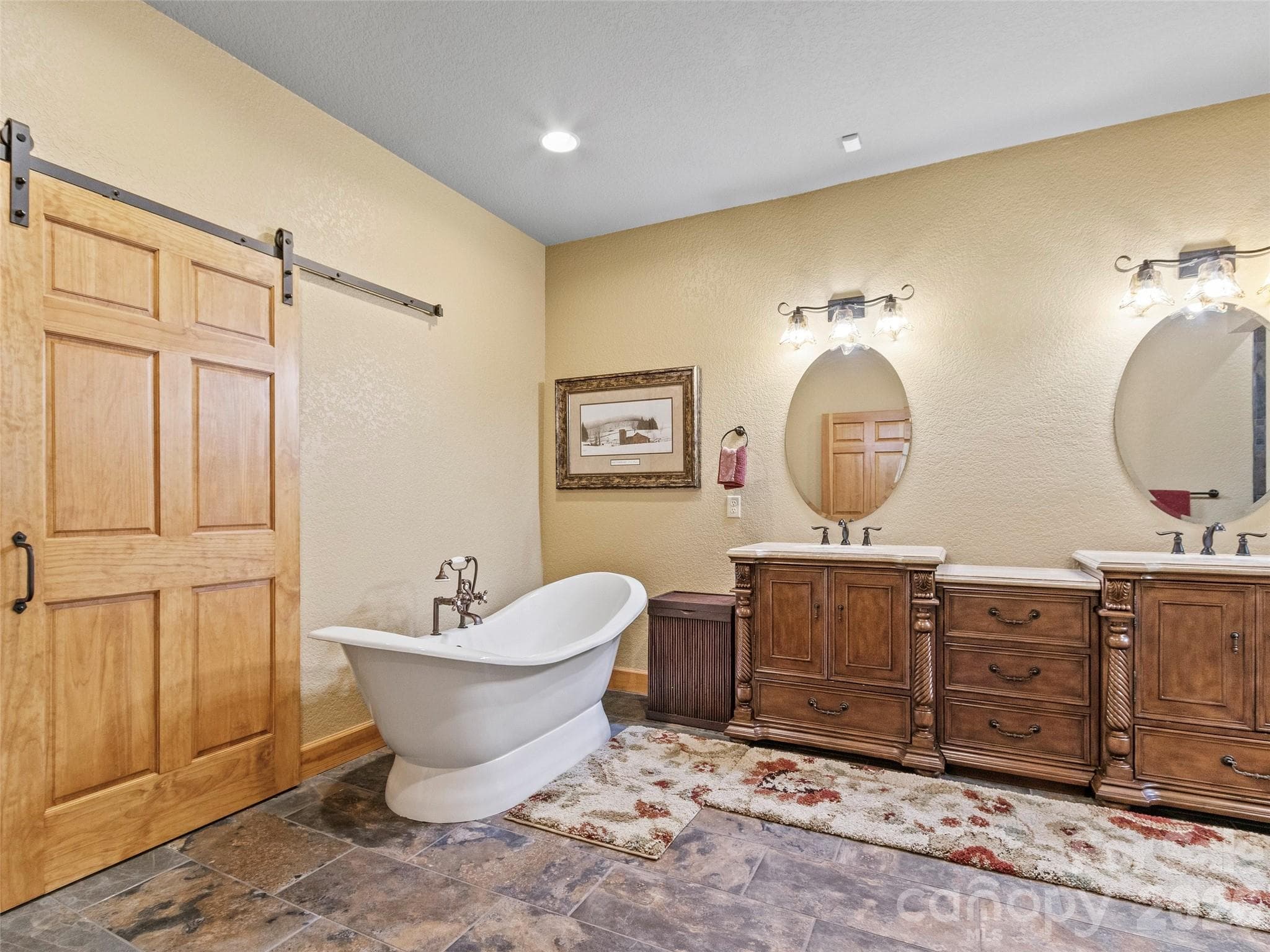 Spa-like en-suite with dual vanities and cast iron slipper tub - 151 Austin Mountain Drive, Burnsville
