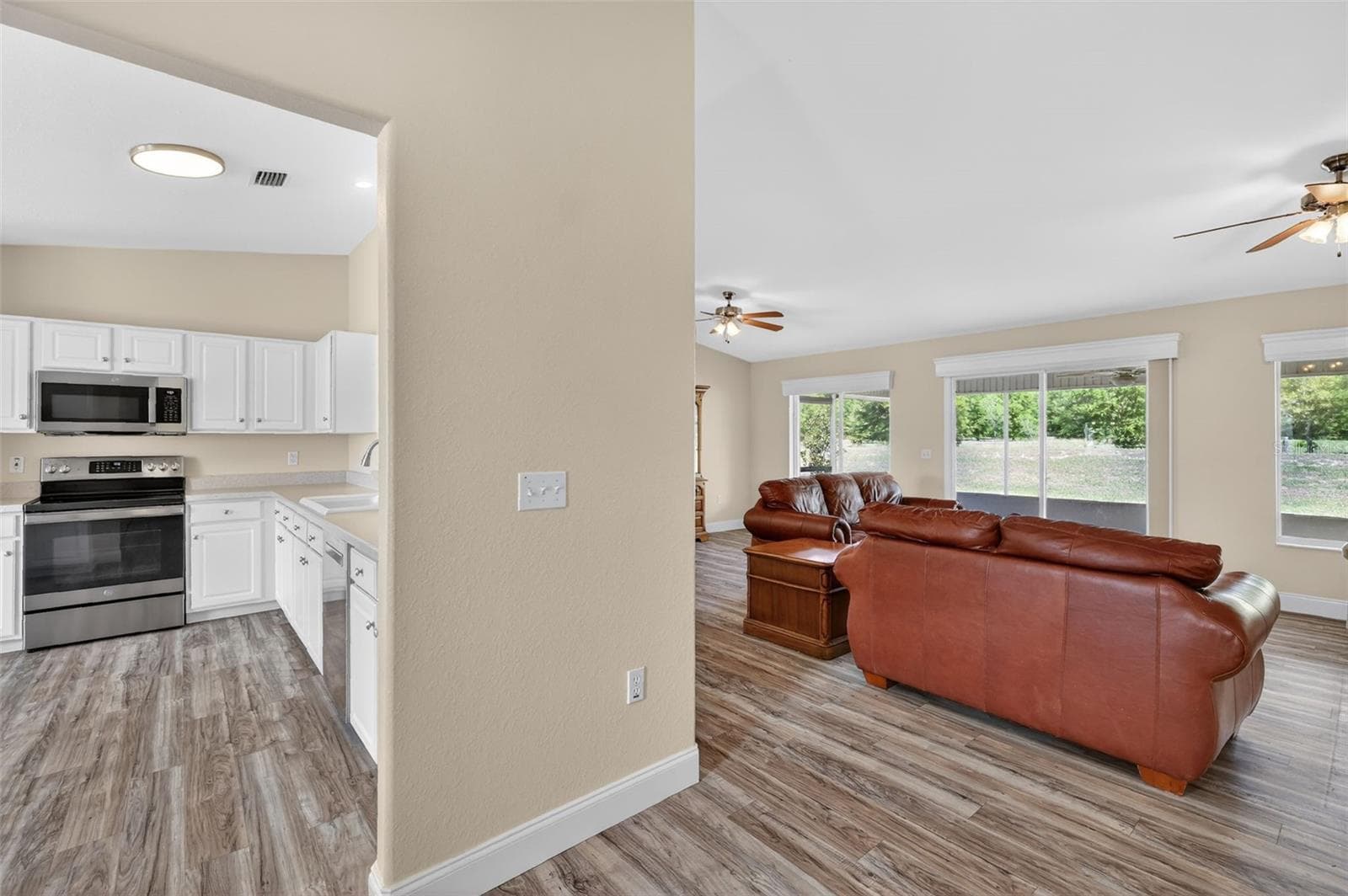 Foyer opening to Kitchen Left- Living area/Dining straight - 13811 SE 85TH CIR, SUMMERFIELD