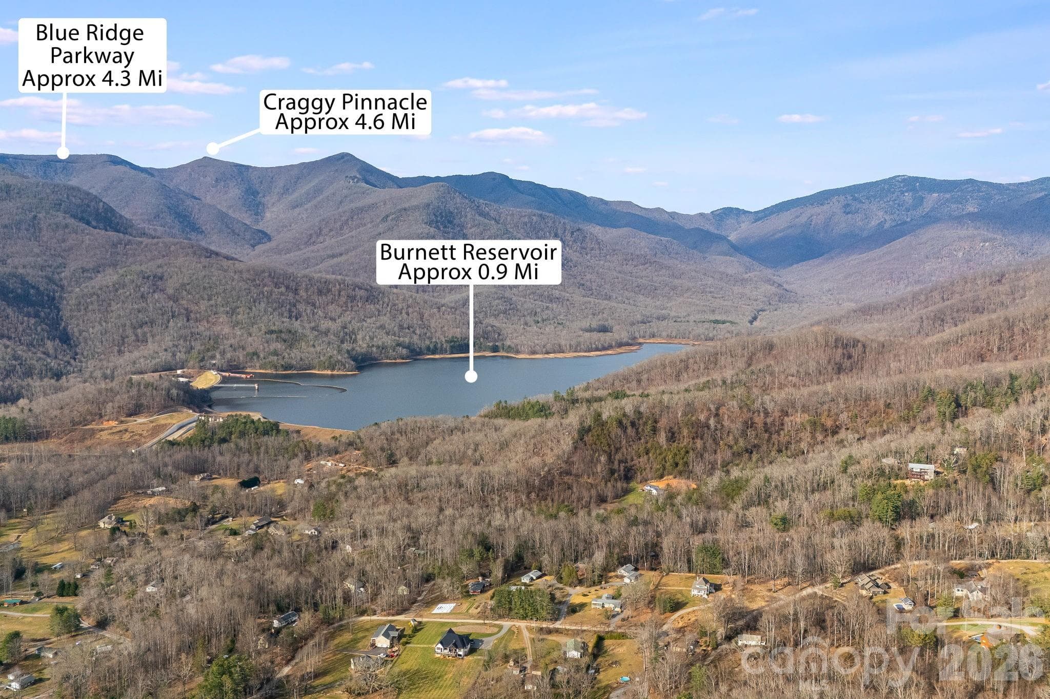 The property is bordered on two sides by protected conservation land, including a 123-acre tract held by the Southern Appalachian Highlands Conservancy, ensuring enduring privacy and seclusion. - Black Mountain