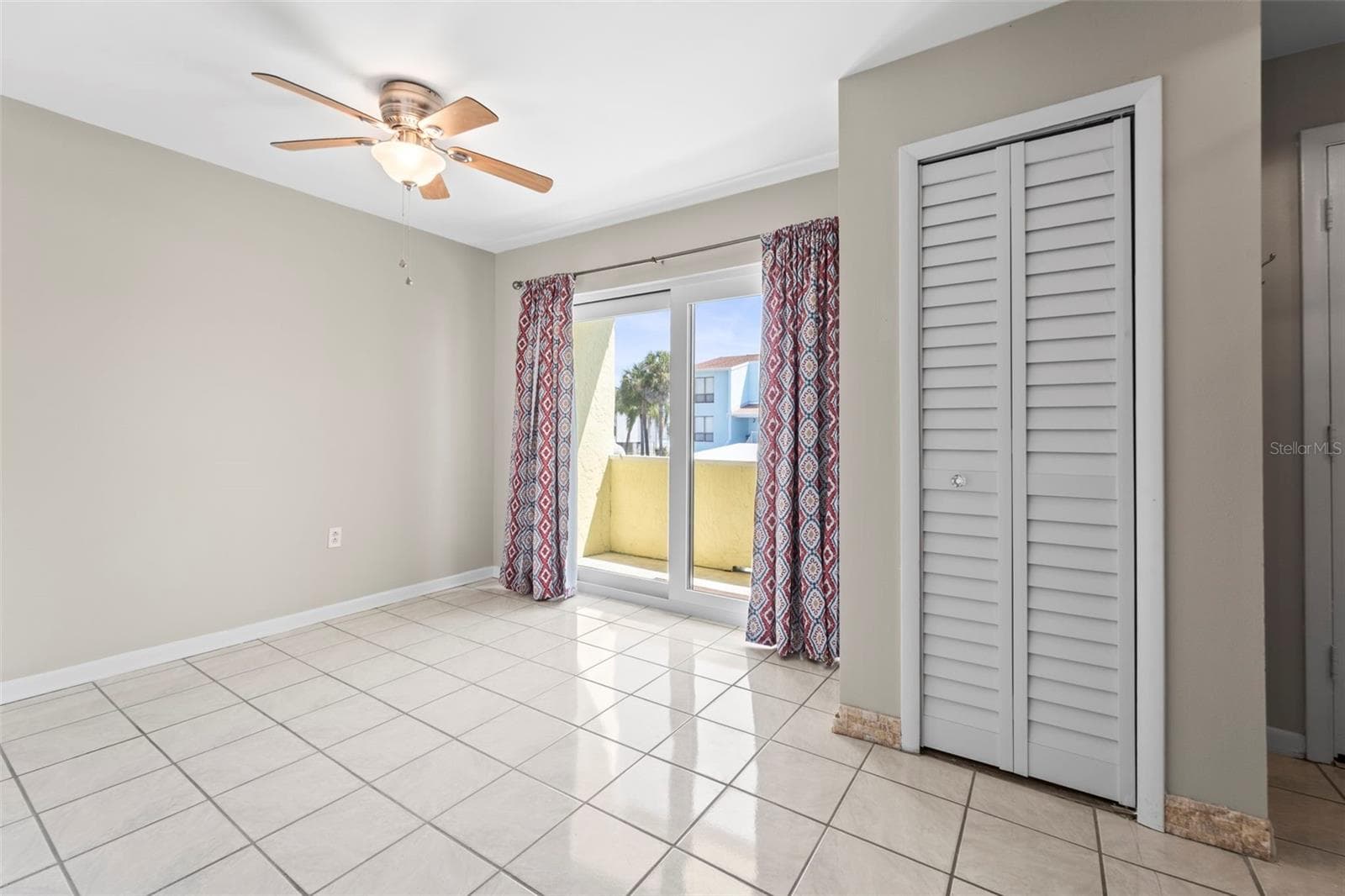 Dining area overlooking porch...showing closet - 1 WINDRUSH BLVD #24, INDIAN ROCKS BEACH