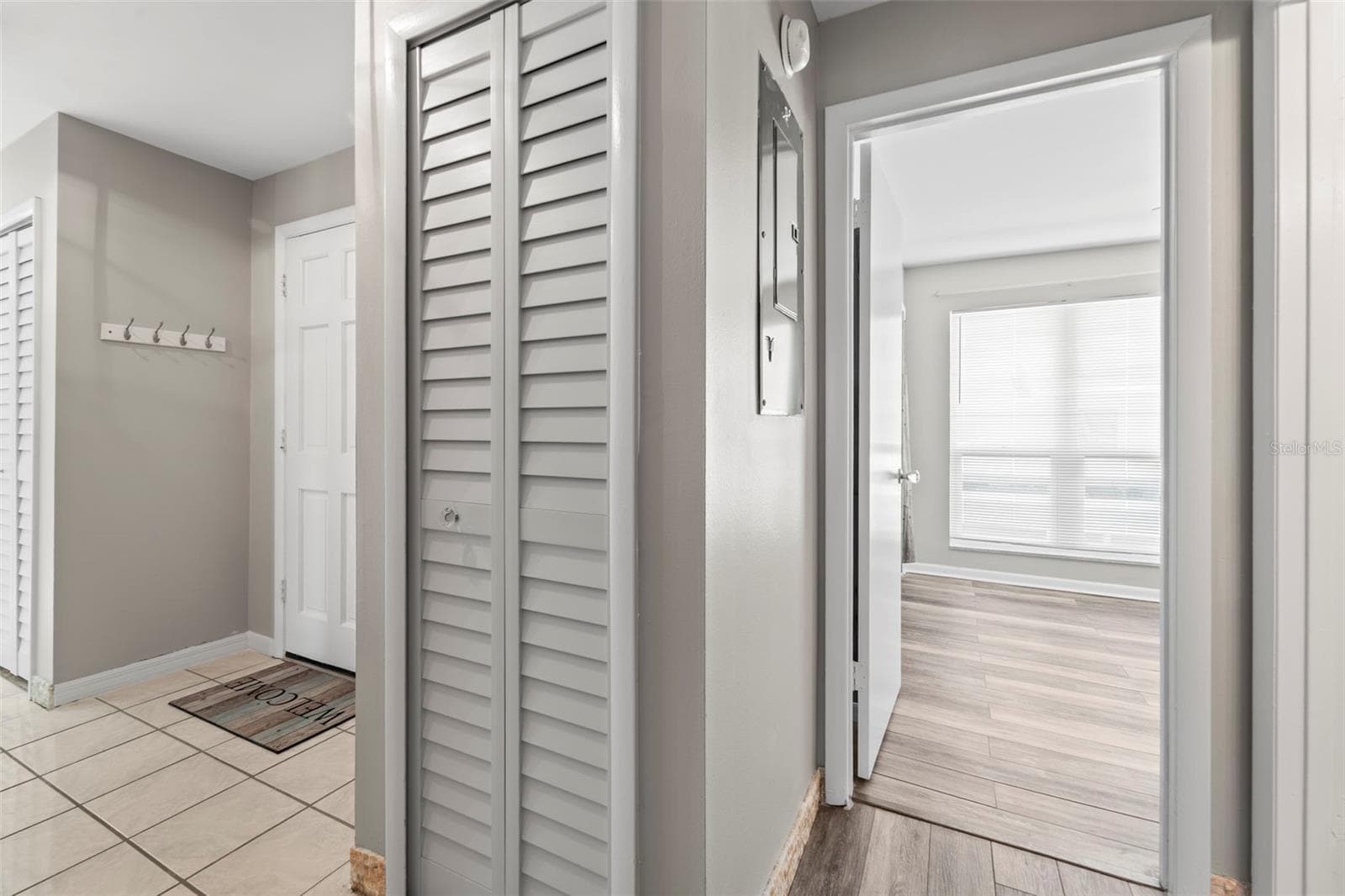 View from the hallway into the second bedroom - 1 WINDRUSH BLVD #24, INDIAN ROCKS BEACH