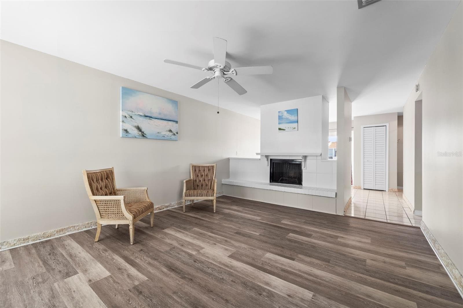 L:iving room showing the fireplace - 1 WINDRUSH BLVD #24, INDIAN ROCKS BEACH