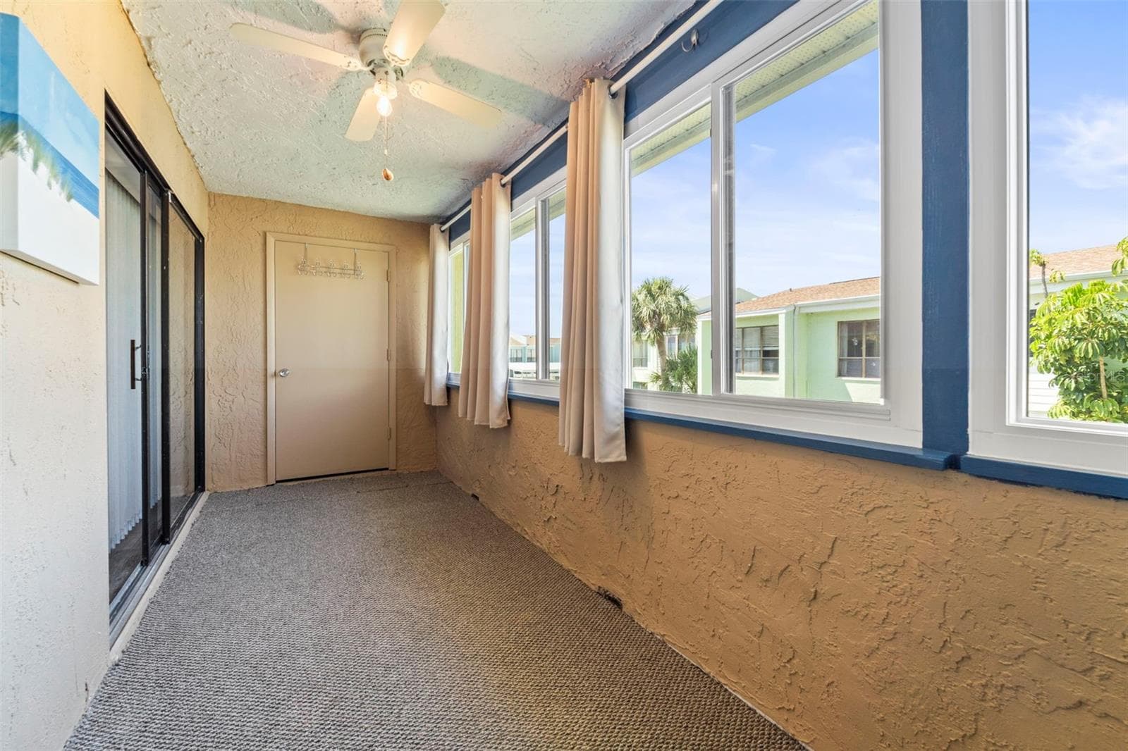Another view of the back porch...i.e. Florida room...contains new windows - 1 WINDRUSH BLVD #24, INDIAN ROCKS BEACH