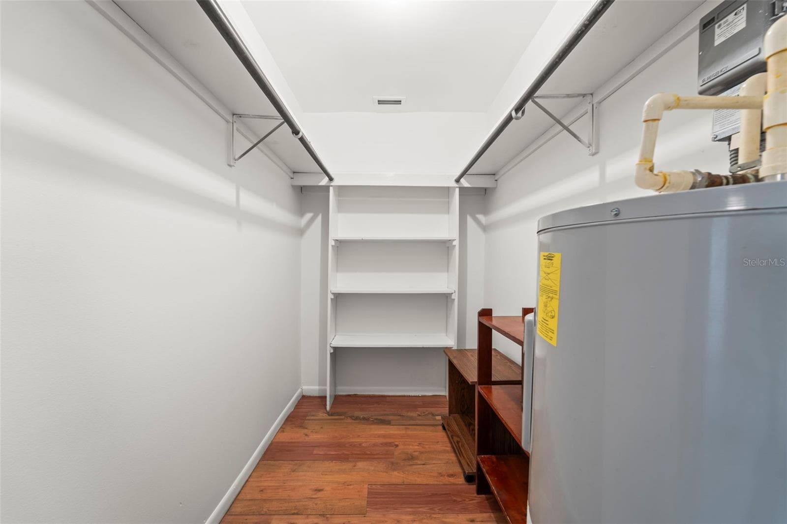 Primary bedroom walk in closet - 1 WINDRUSH BLVD #24, INDIAN ROCKS BEACH
