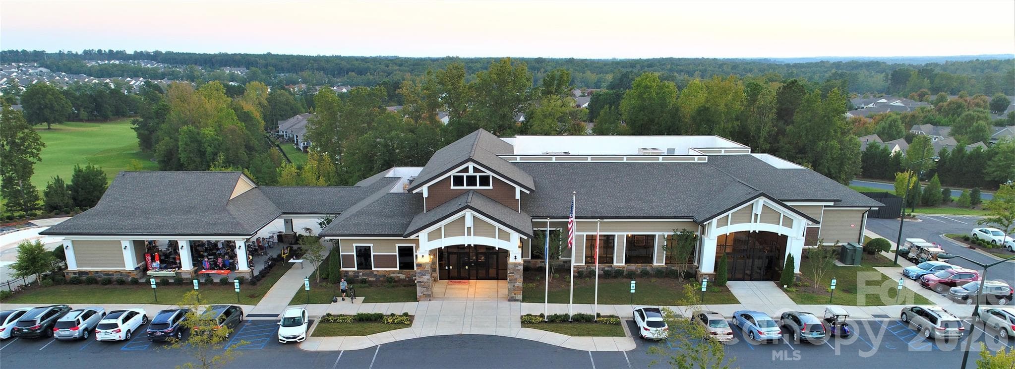 The Lodge houses an outdoor pool, pickleball courts, outside workout stations, a pavilion and open outdoor area where you can relax by the large firepit. It is home to SCCL's Performing Arts Club and the interior ballroom is used for performances and a wide variety of SCCL club and social activities. SCCL Veterans are honored both inside and outside of The Lodge. Be sure to check out the tributes to our Vets in the lobby and at the Veterans Memorial near the pavilion. - Indian Land