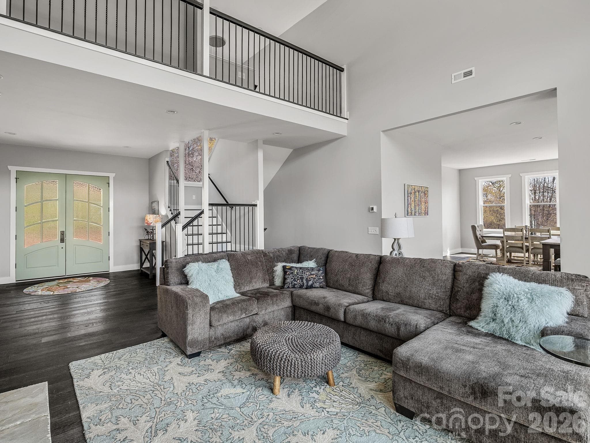 Open plan with stairway to upper floor primary suite. - 345 Preservation Trail, Columbus