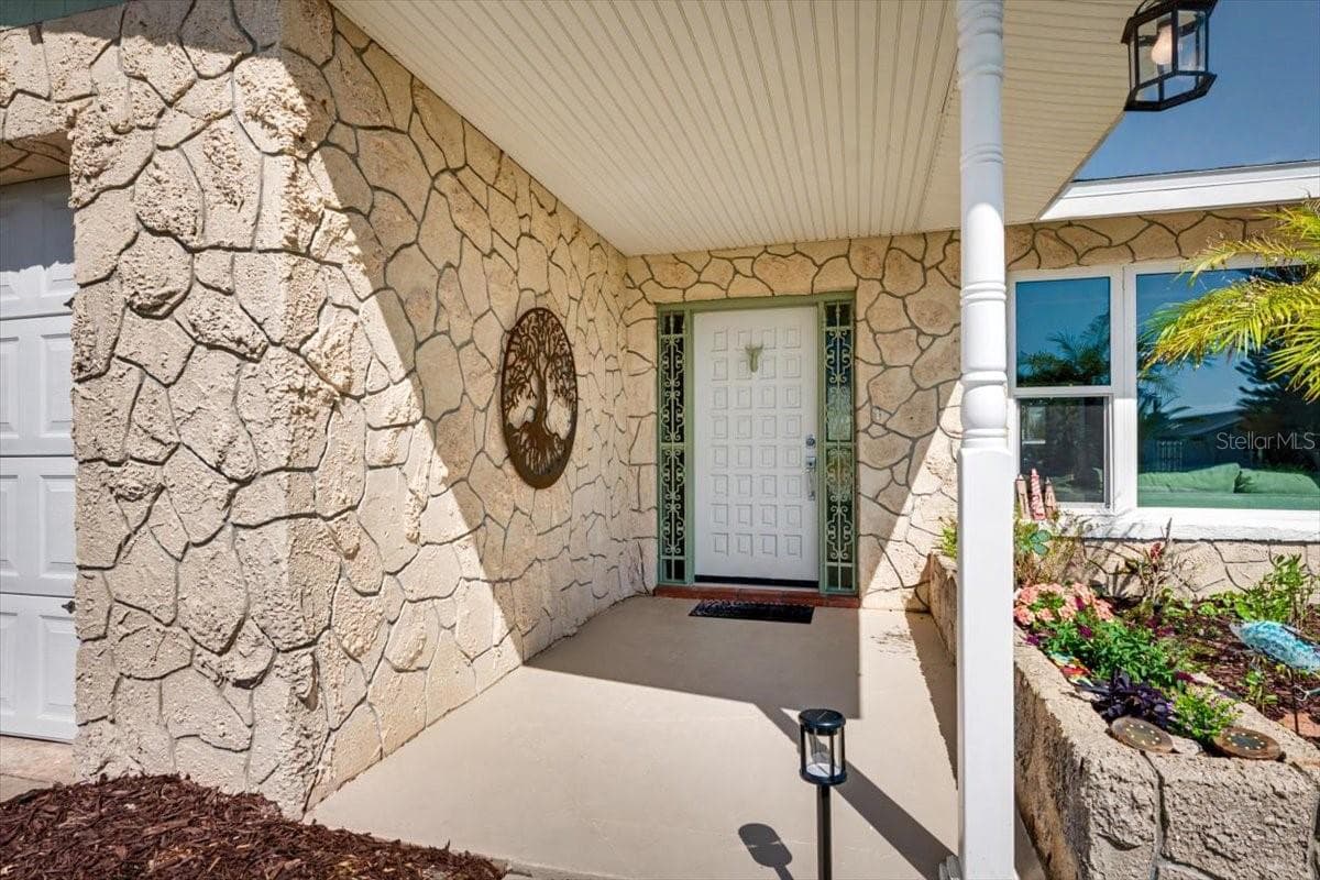 Front Entry Exterior - 124 ANCHOR DR, PONCE INLET