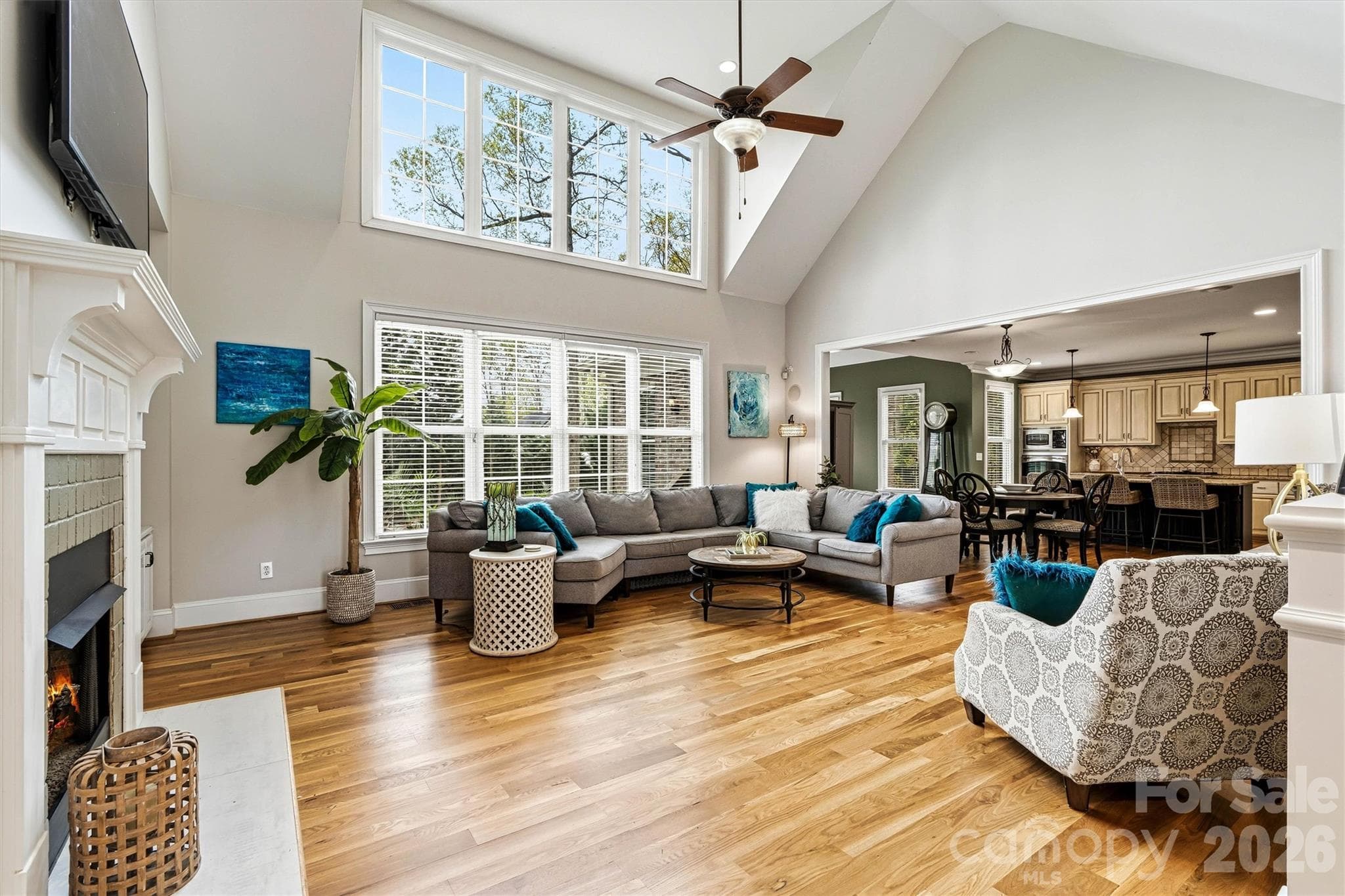 Vaulted great room with fireplace and custom built-ins - Stanley
