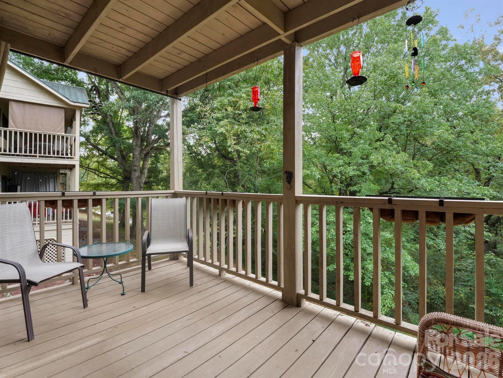 Back deck overlooking woods - 160 Whitney Boulevard, Lake Lure