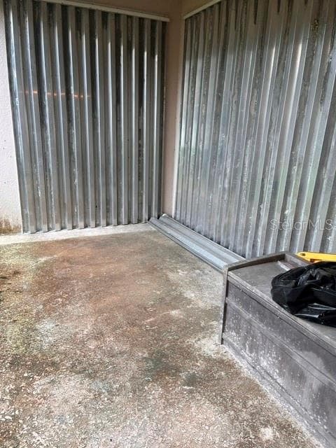Patio with Hurricane shutters down - 10049 SAVANNAH BLUFF LN, ORLANDO