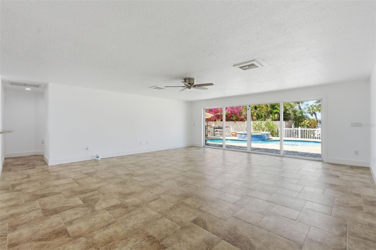 Living Room/Hallway to Rooms 2 and 3 - 711 64TH AVE, ST PETE BEACH