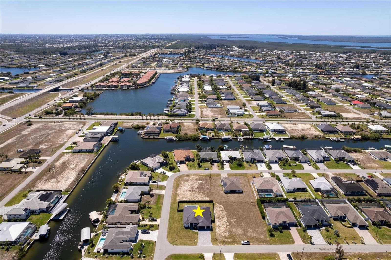 Minutes from the future Seven Islands Waterfront Community, planned w/ marinas, waterfront dining, boutique retail, parks & resort-style attractions - supporting strong long-term growth & value. - 3300 NW 1ST TER, CAPE CORAL