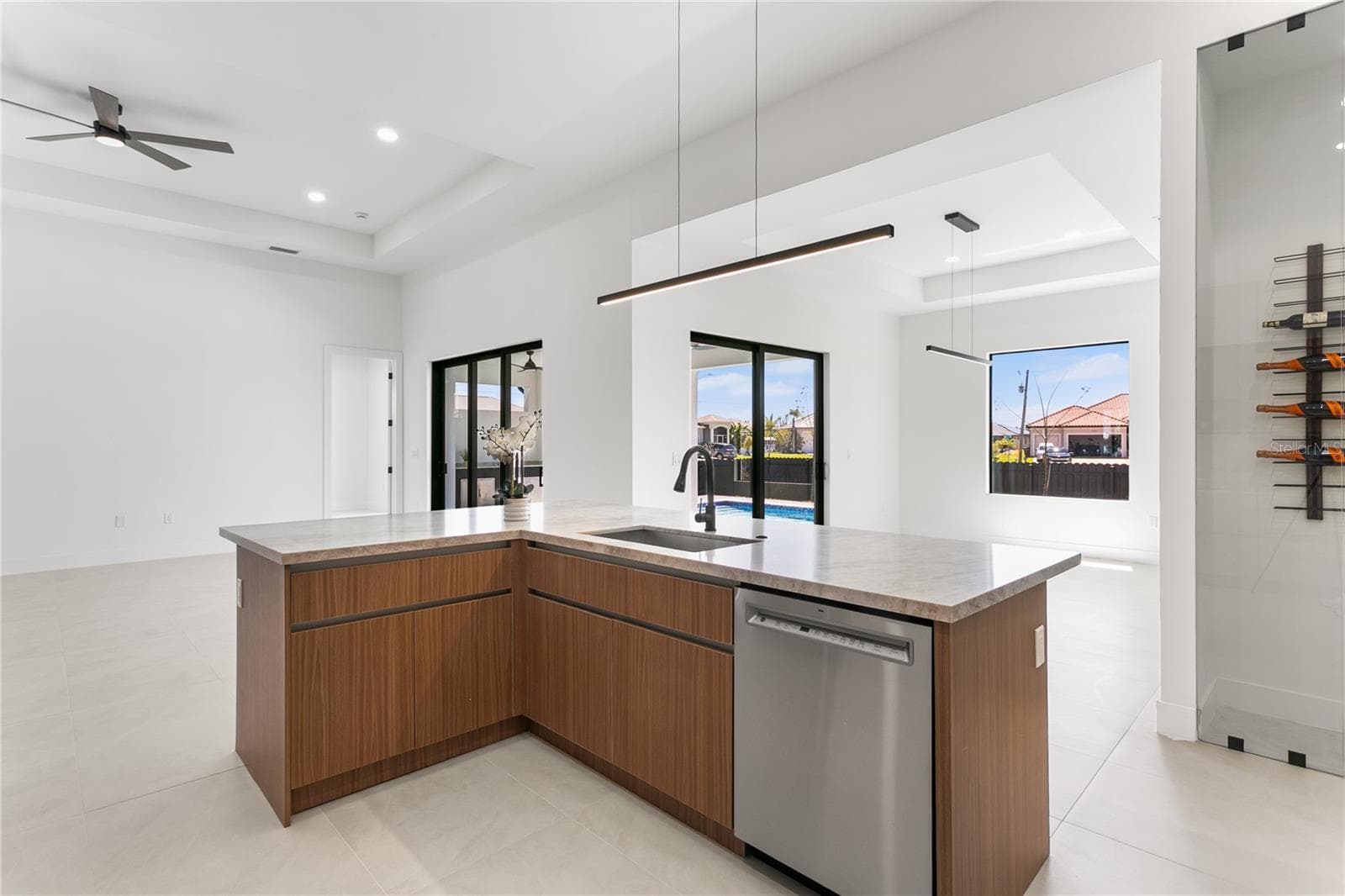 A 36-bottle WINE STORAGE adds a REFINED TOUCH! - 3300 NW 1ST TER, CAPE CORAL