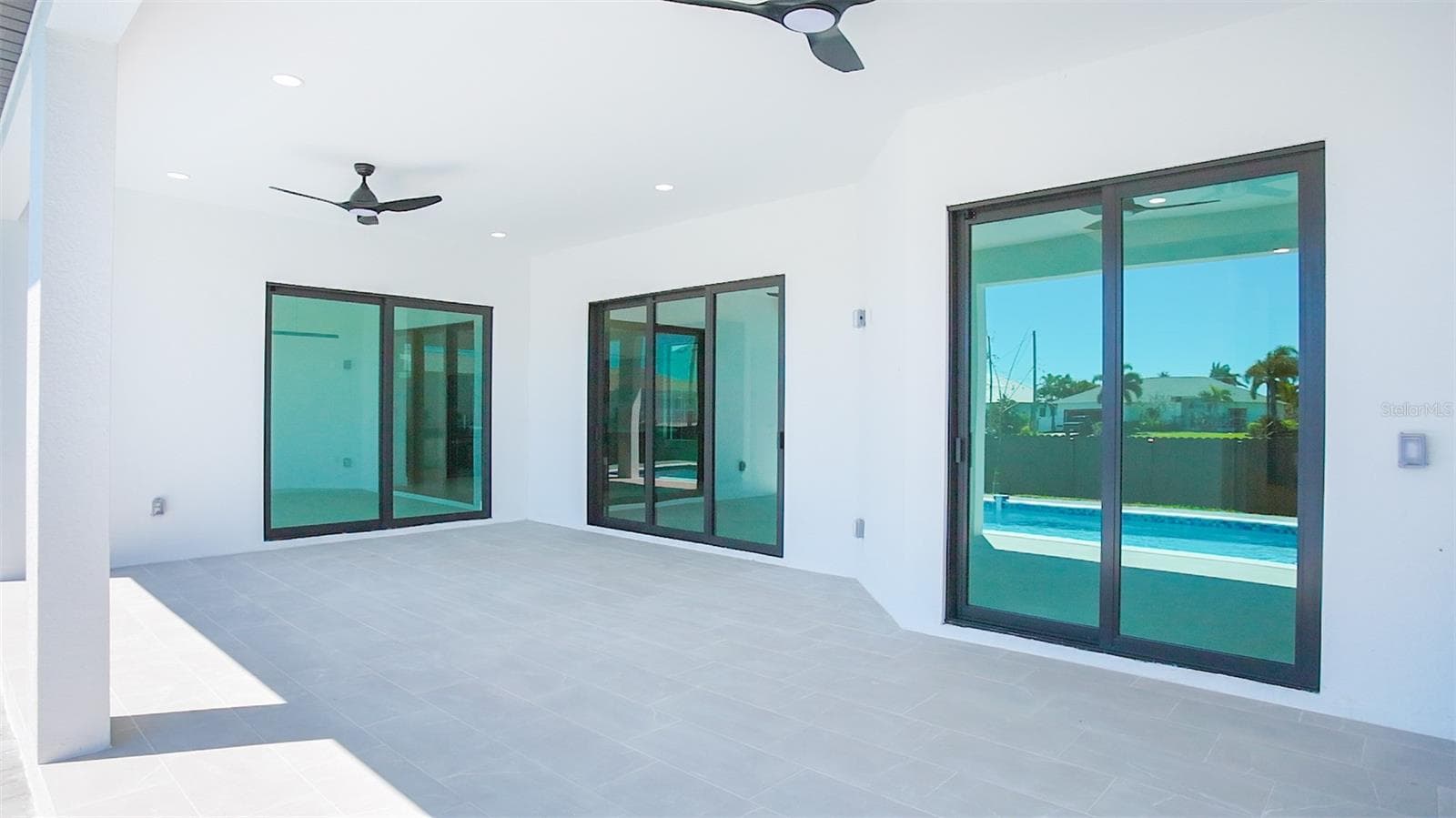 Expansive patio provides the perfect space for outdoor dining, lounging, and hosting gatherings year-round. - 3300 NW 1ST TER, CAPE CORAL