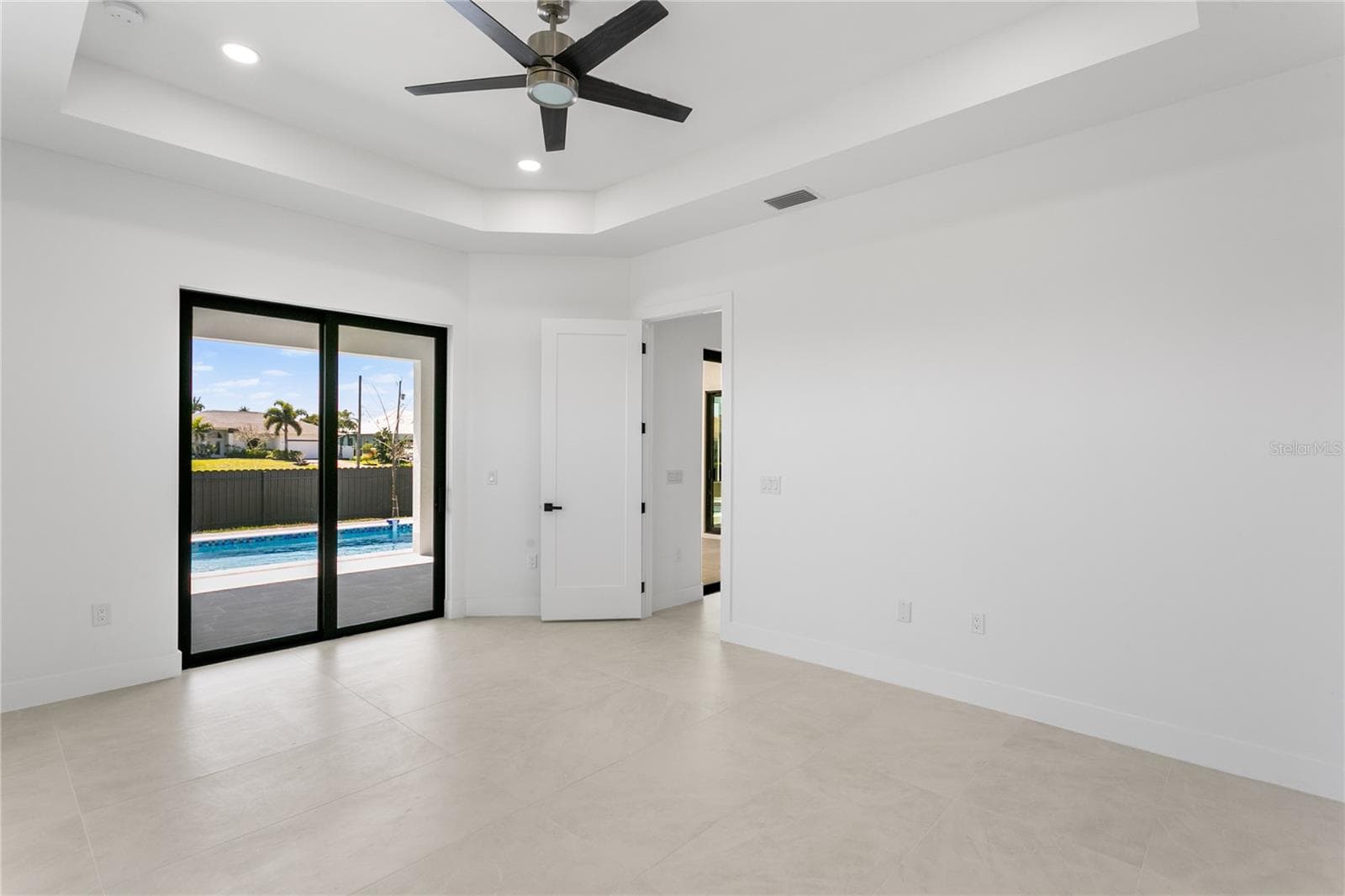 The PRIMARY SUITE is a TRUE RETREAT w/ TWO WALK-IN CLOSETS - 3300 NW 1ST TER, CAPE CORAL
