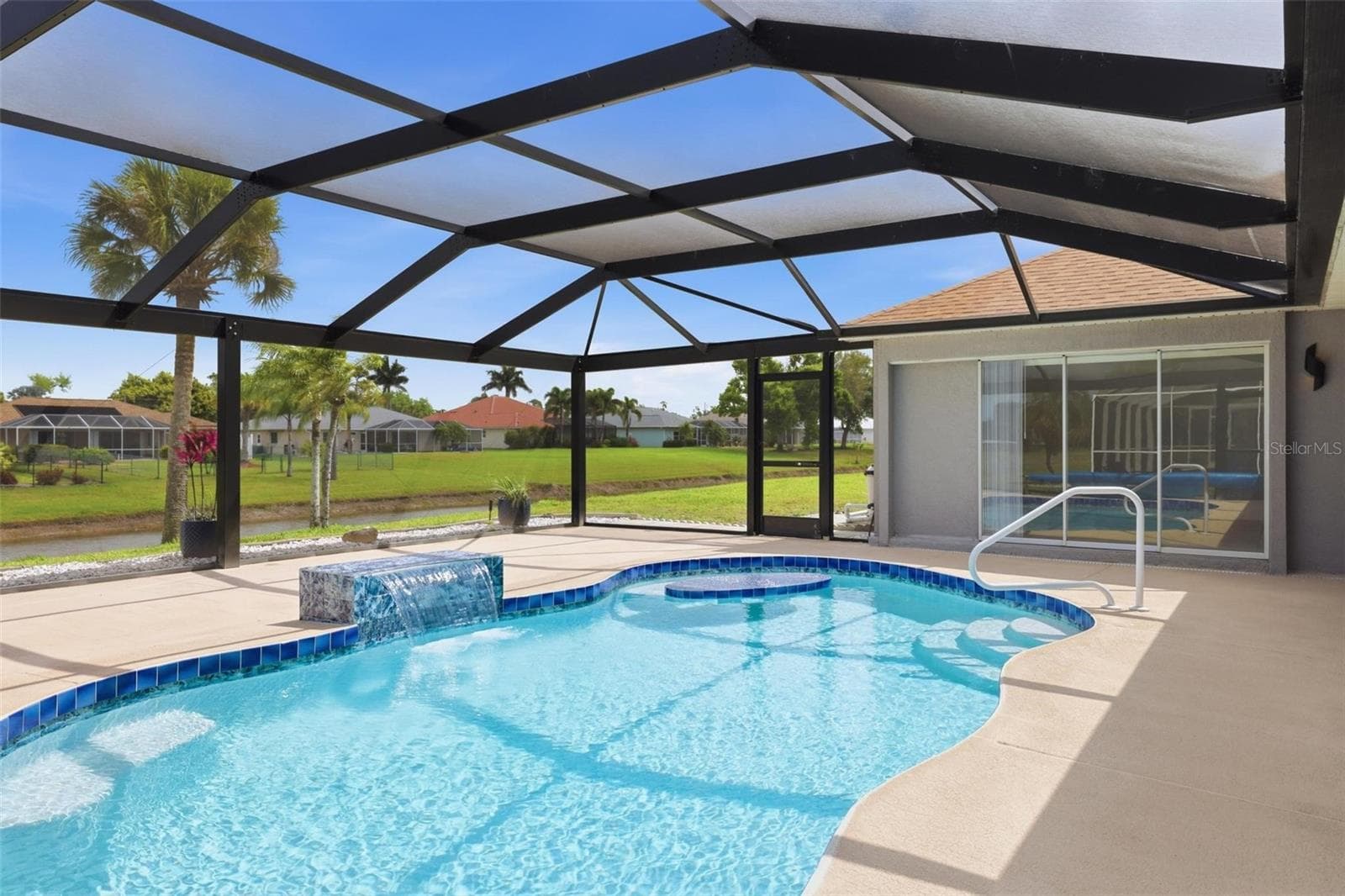 Expansive panoramic screen enclosure with lanai extension added in 2024 - 605 ROTONDA CIR, ROTONDA WEST
