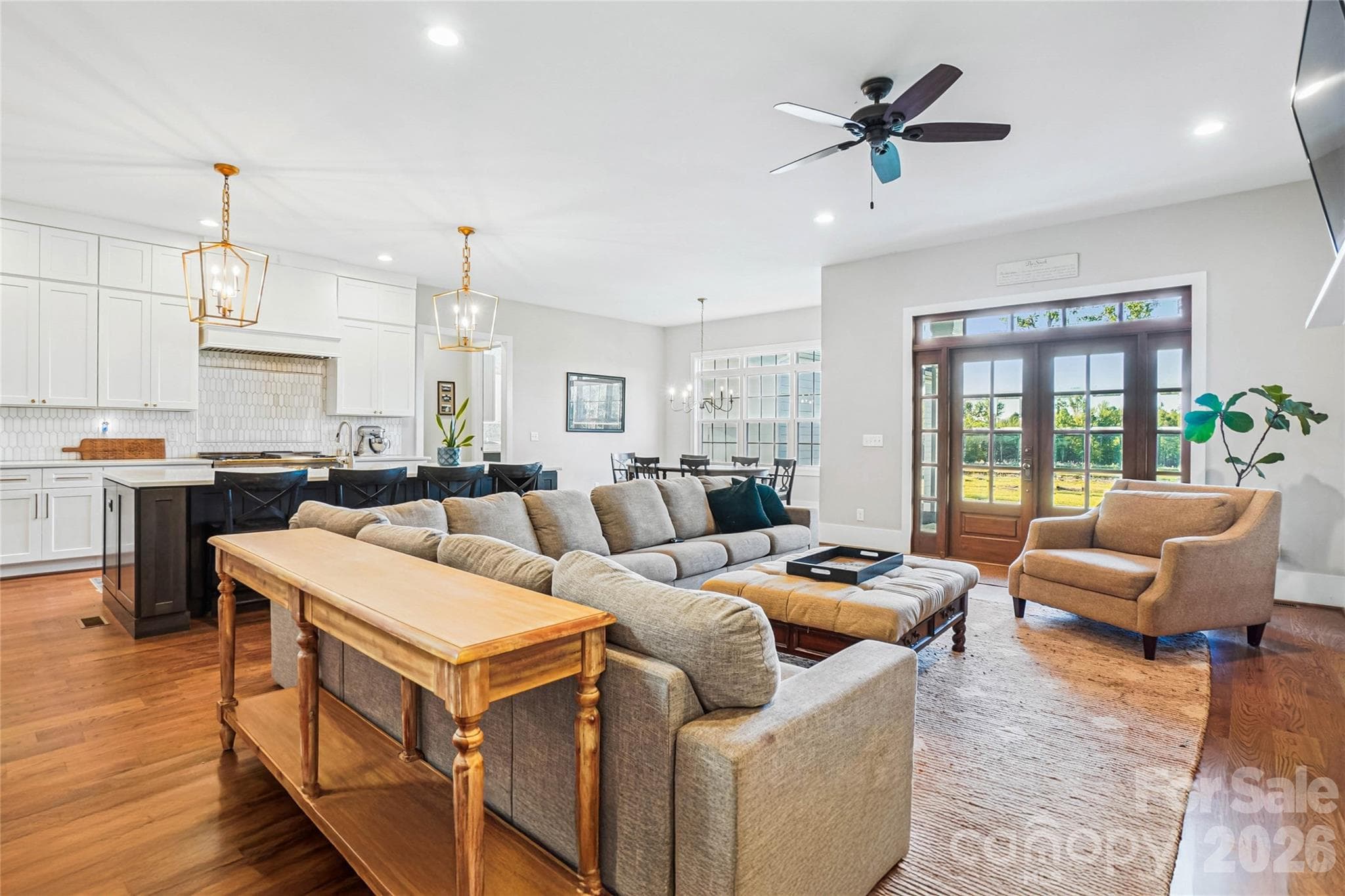 Open floorplan with lots of light and access to a large back porch. - 1904 Canal Road, Catawba