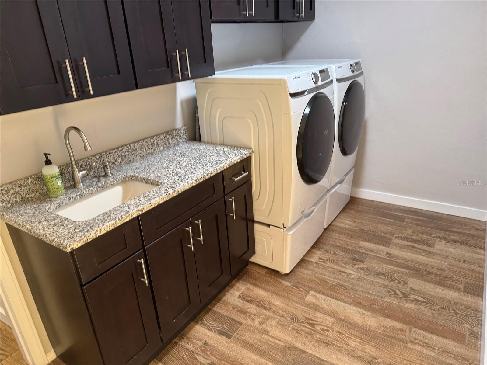 Laundry Room with SinkMany Cabinets - 98 DADE AVE, SARASOTA