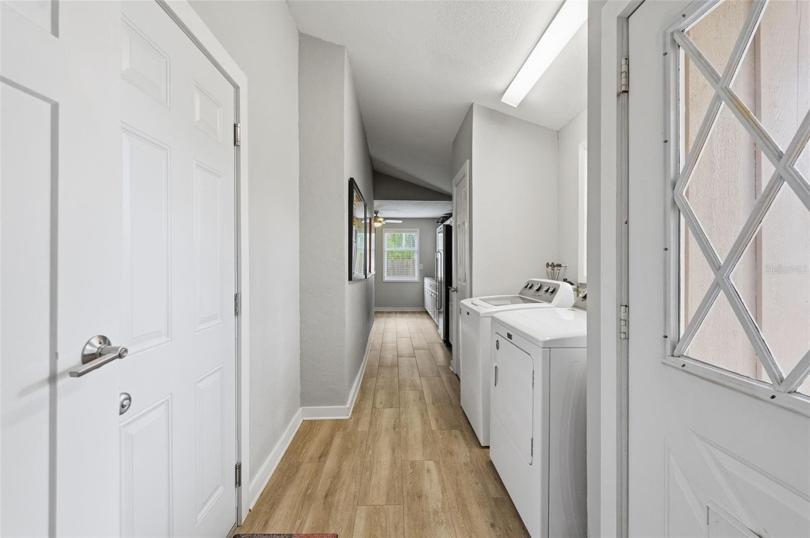 Hallway to the laundry, storage and office - 13917 76TH TER, SEMINOLE