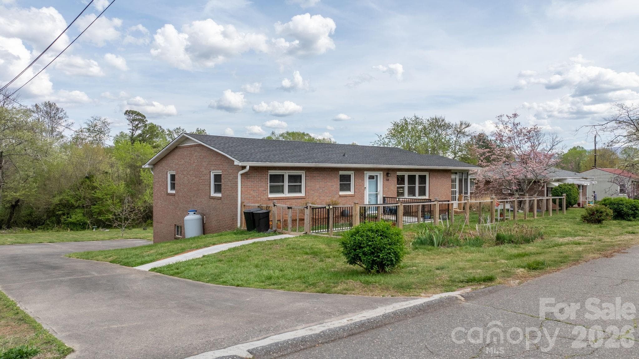 Driveway goes aroundback with large parking pad and a garage - 118 Whitley Road, Morganton