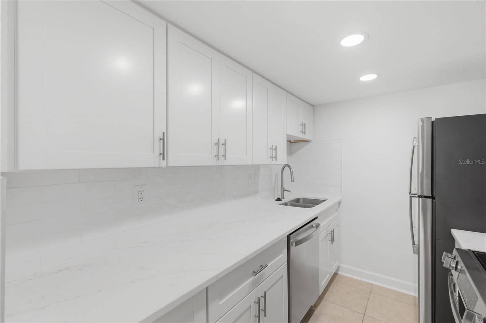 Nice long countertop for cooking. - 8901 BLIND PASS RD #127, ST PETE BEACH