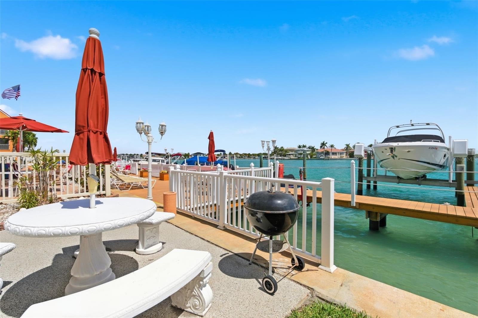 A barbeque grill for those using the sundecks and pool - 8901 BLIND PASS RD #127, ST PETE BEACH