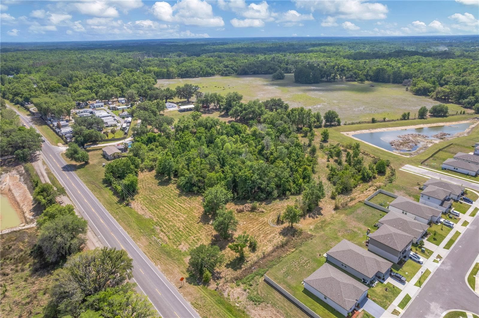 Land at CORNER OF PAUL S BUCHMAN HWY & FORREST PLUM CT, ZEPHYRHILLS, photo 2 of 16