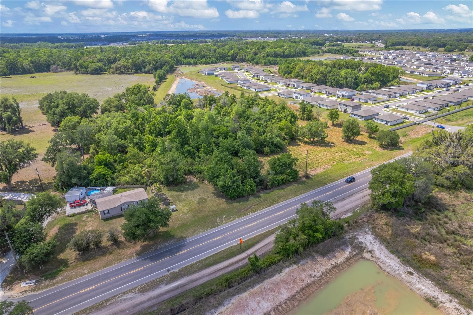 Land at CORNER OF PAUL S BUCHMAN HWY & FORREST PLUM CT, ZEPHYRHILLS, photo 3 of 16