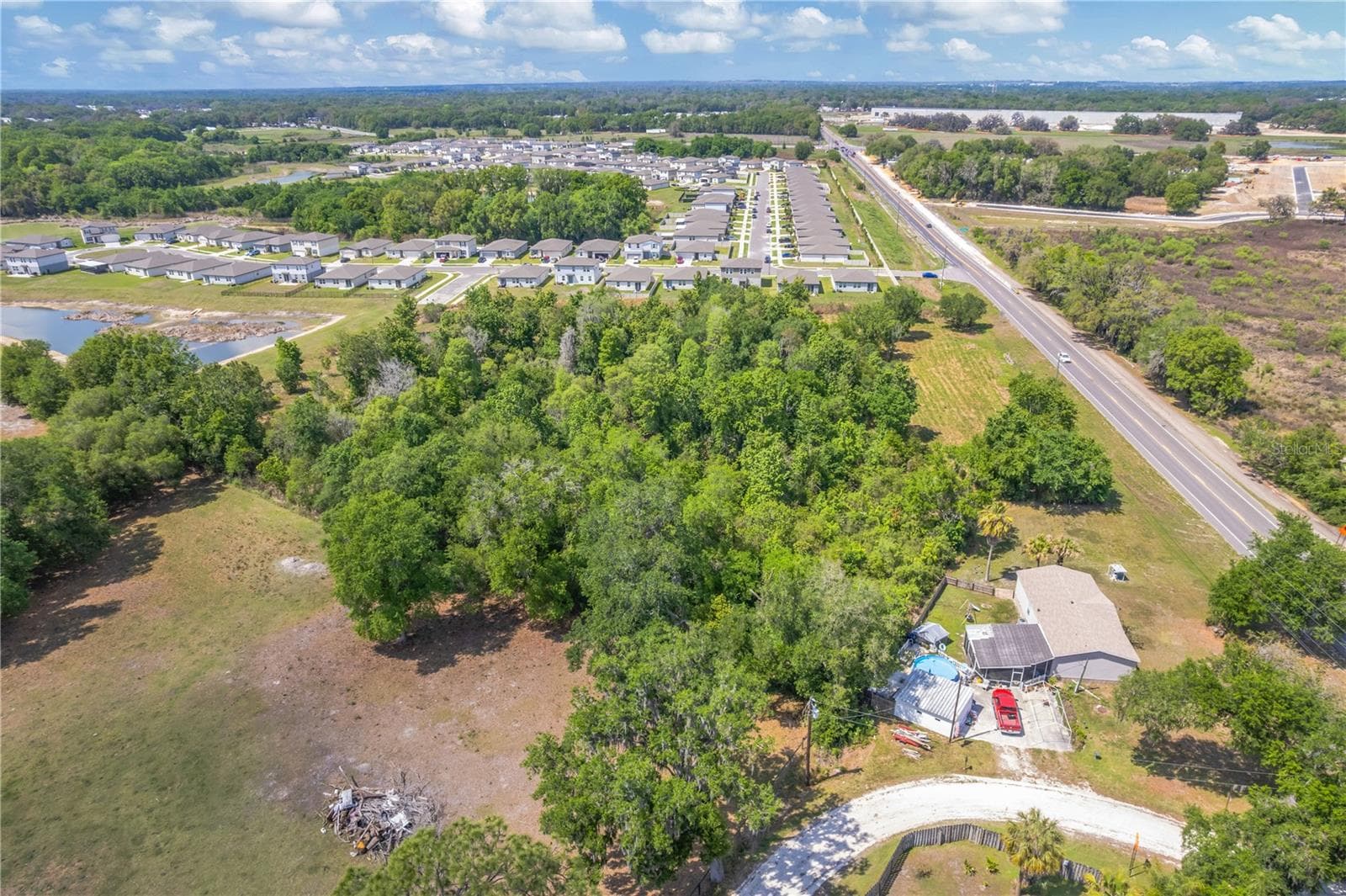 Land at CORNER OF PAUL S BUCHMAN HWY & FORREST PLUM CT, ZEPHYRHILLS, photo 5 of 16