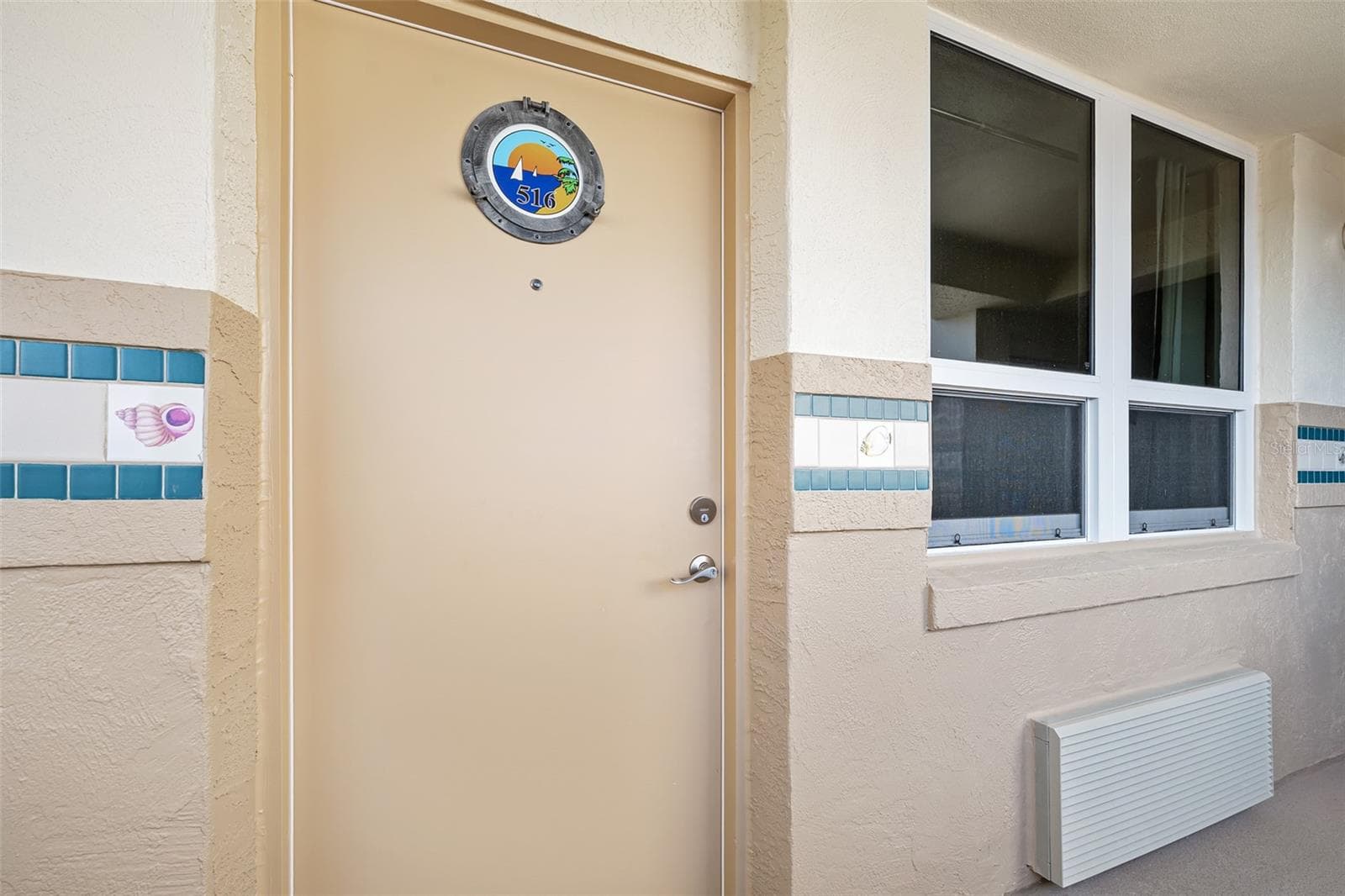 New door to the unit - 701 S ATLANTIC AVE #516, DAYTONA BEACH
