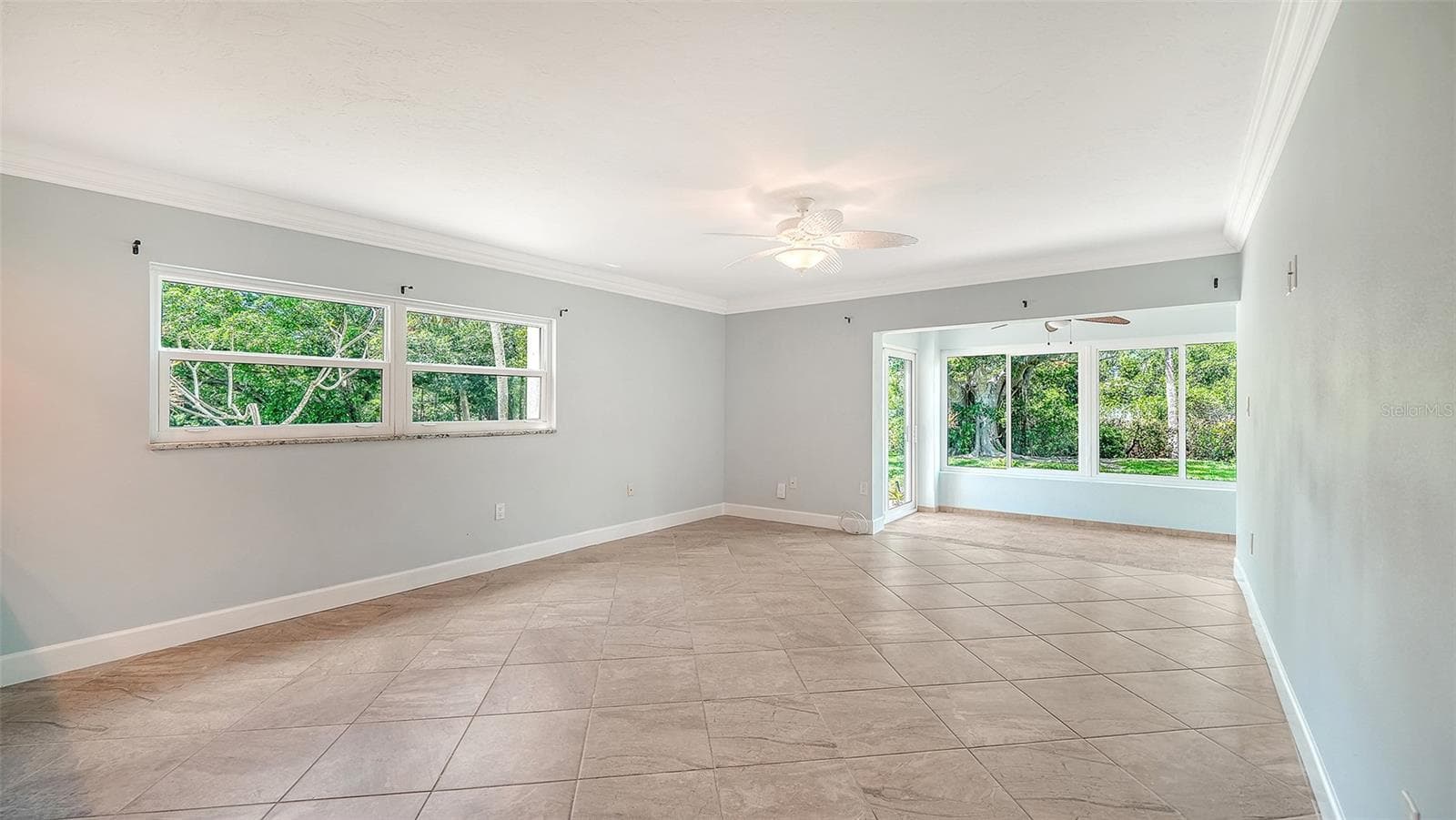 Unit #106 is a rare end unit featuring an extra, large sunny window in the living room. - 225 HOURGLASS WAY #106, SARASOTA