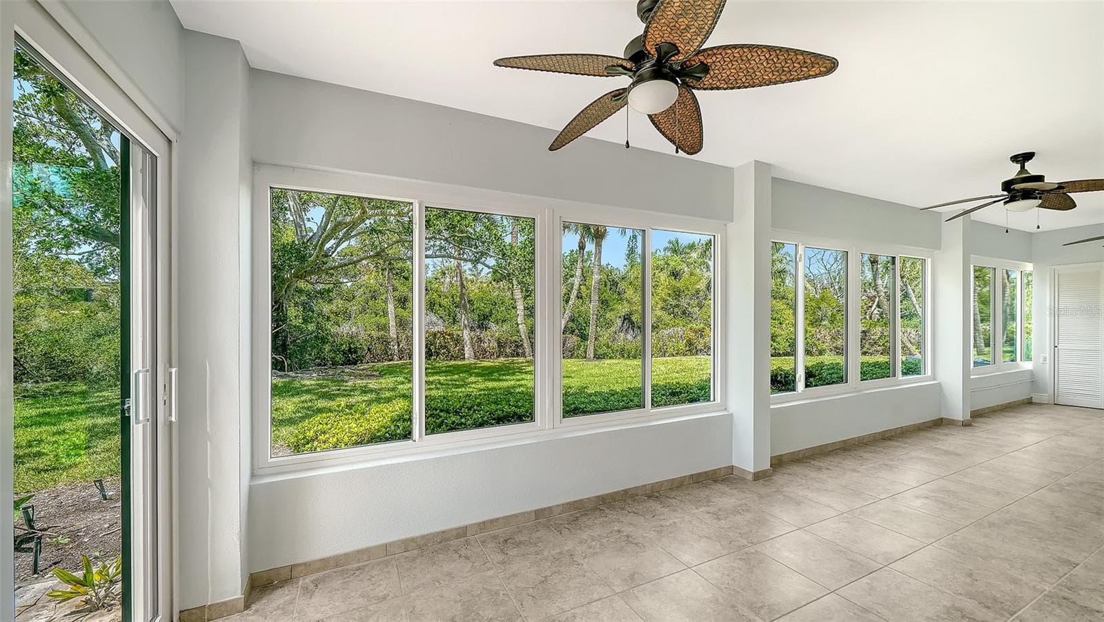 Sundrenched lanai includes hurricane impact sliders with a nice private view of the lagoon. - 225 HOURGLASS WAY #106, SARASOTA