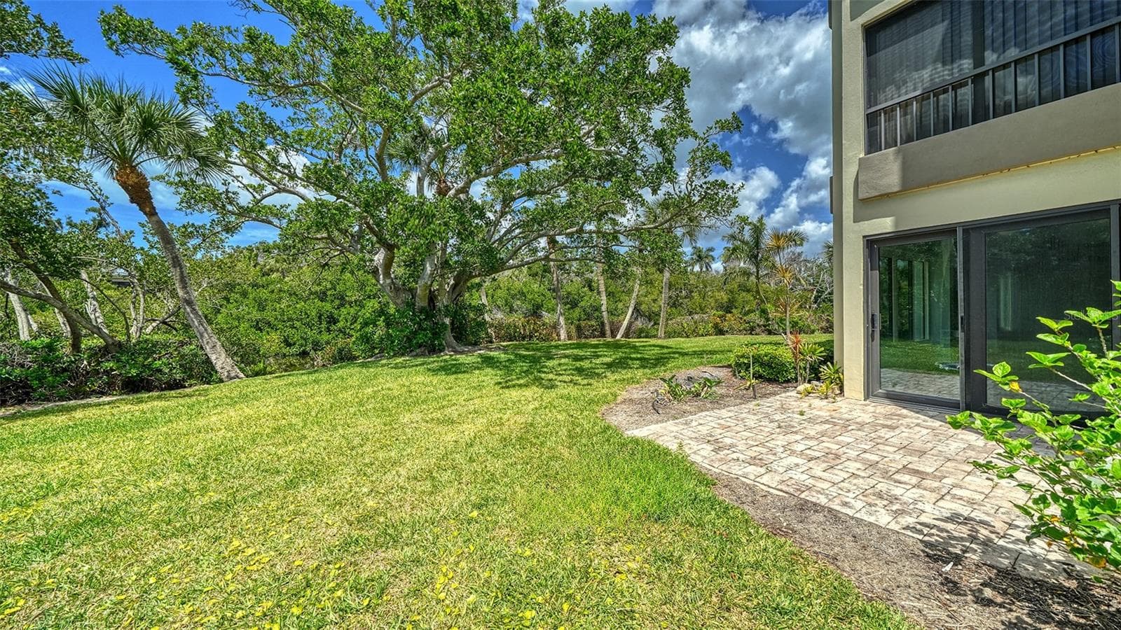 The back patio of the unit. - 225 HOURGLASS WAY #106, SARASOTA