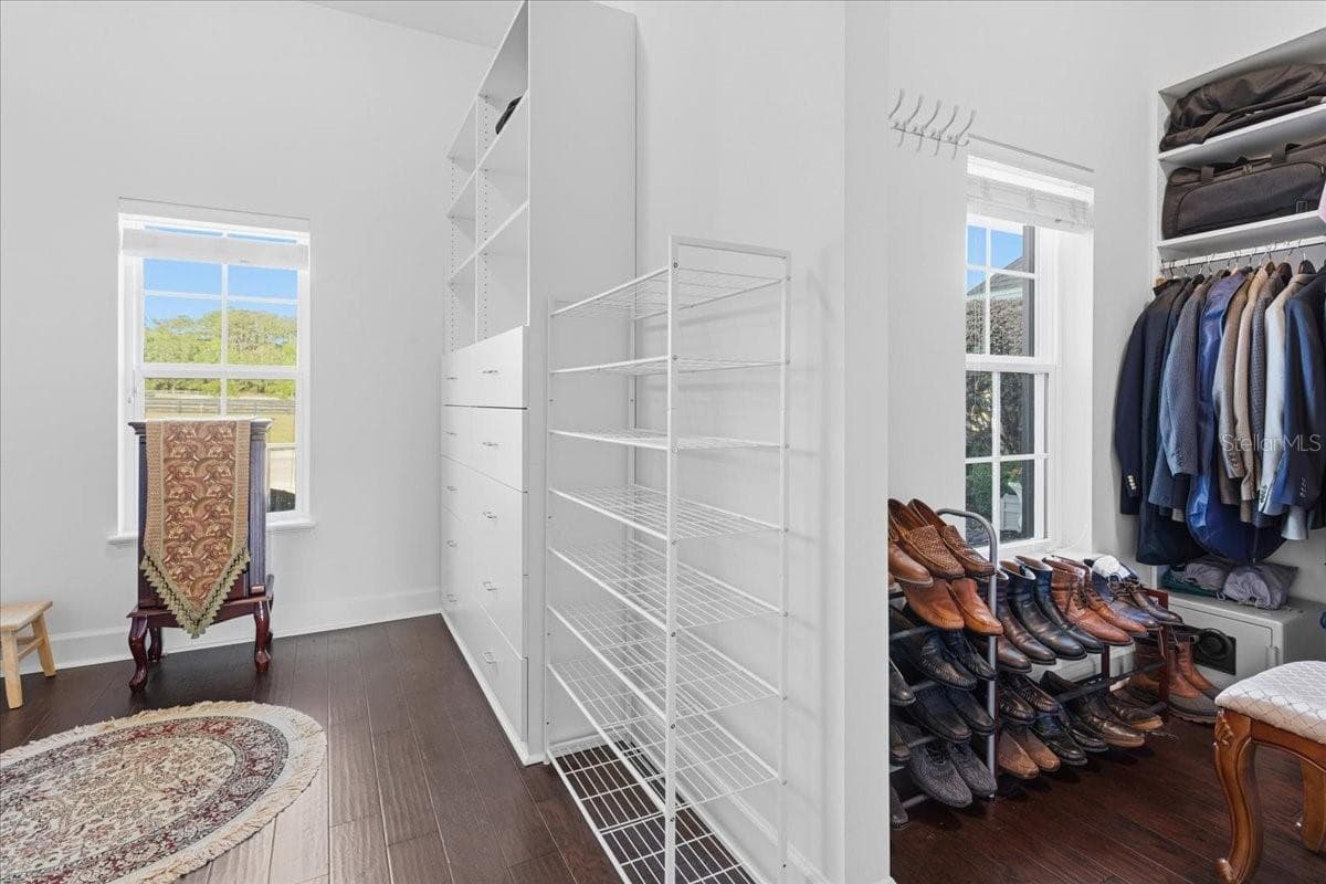 Primary bedroom walk-in closet - 10401 NW 153RD TER, ALACHUA