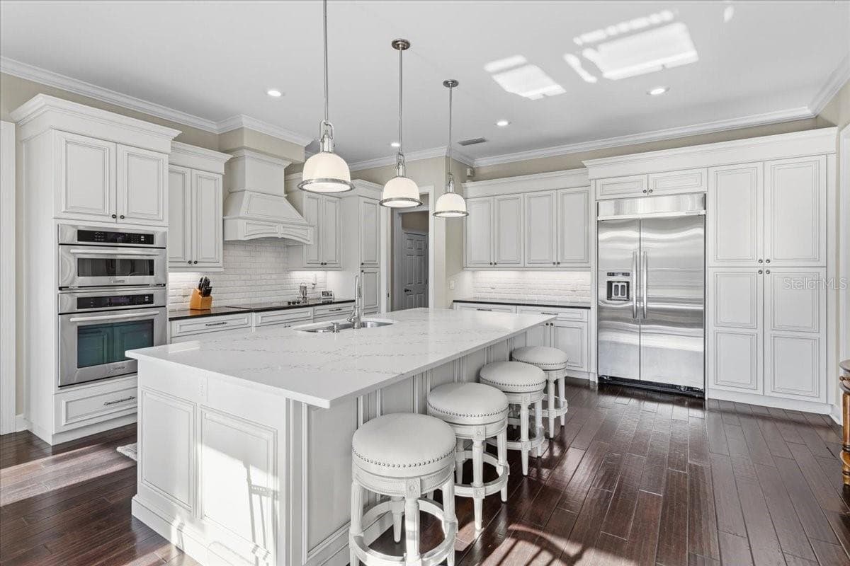 Range is plumbed for gas if buyer prefers a gas range. - 10401 NW 153RD TER, ALACHUA