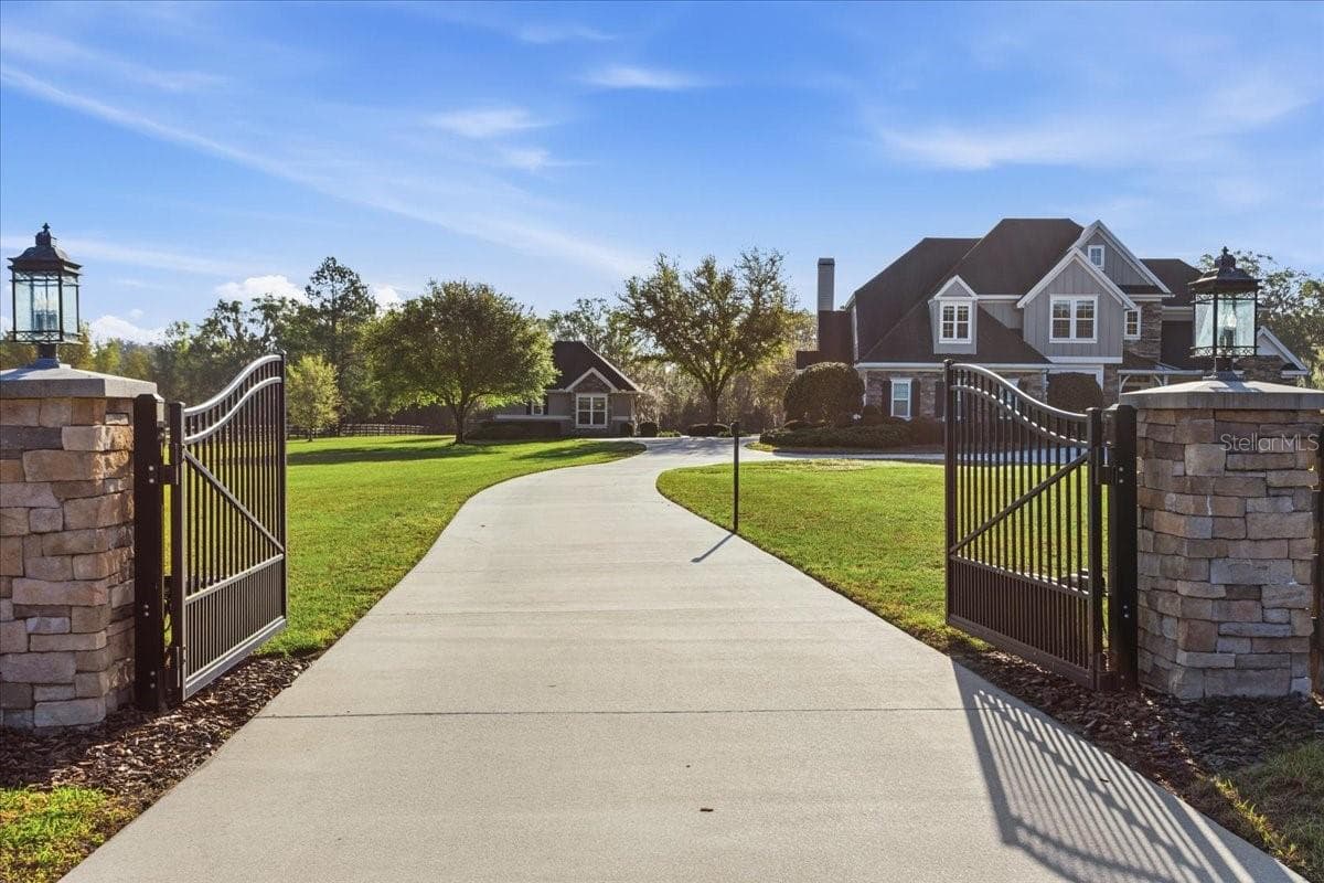 Double-gated estate home. Red Oaks Estates offers a gated community plus this residence has its own beautiful gate. - 10401 NW 153RD TER, ALACHUA