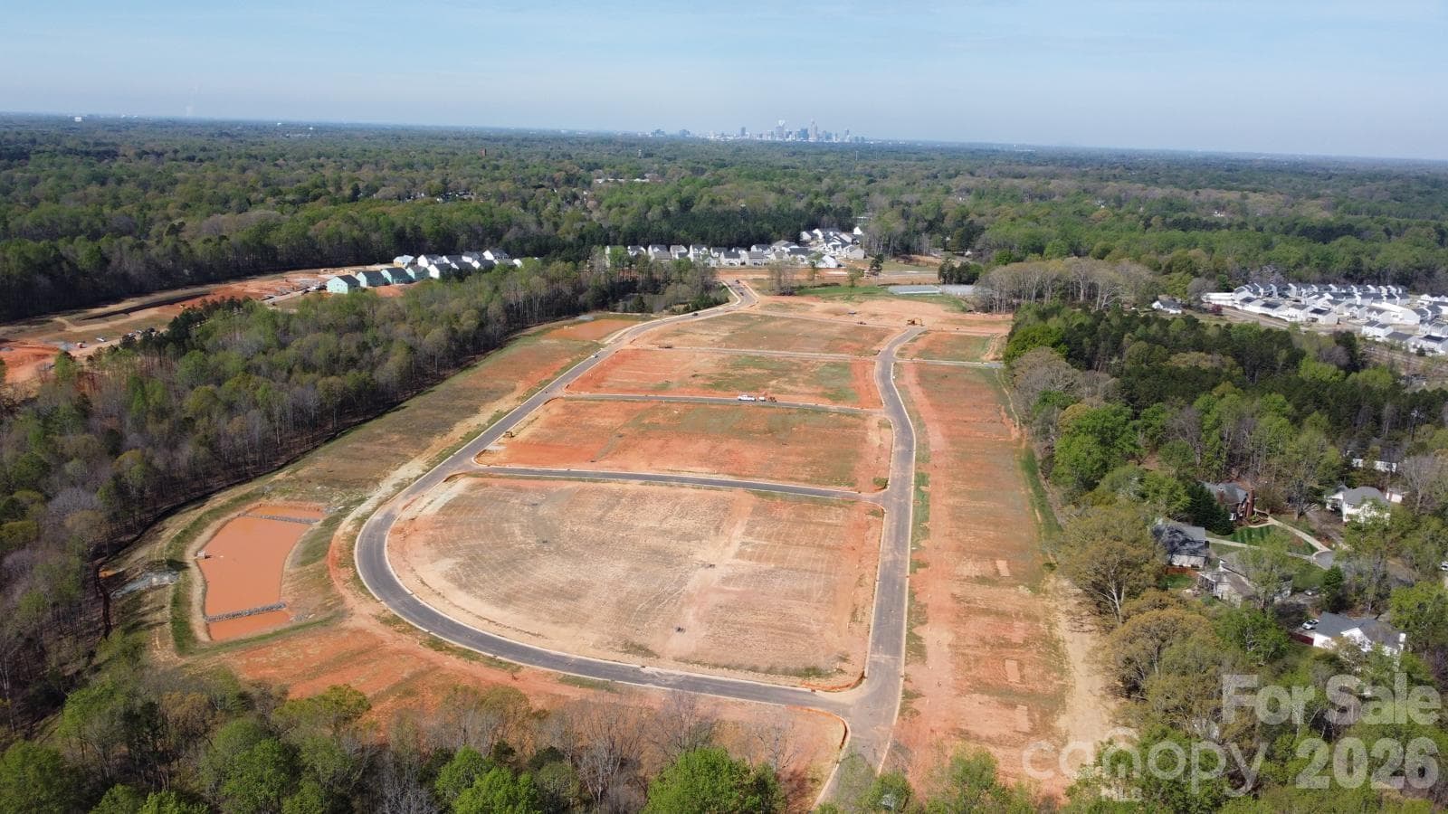 Arial view of the Clairmont community with uptown on the horizon. - 1227 Bansal Drive, Charlotte