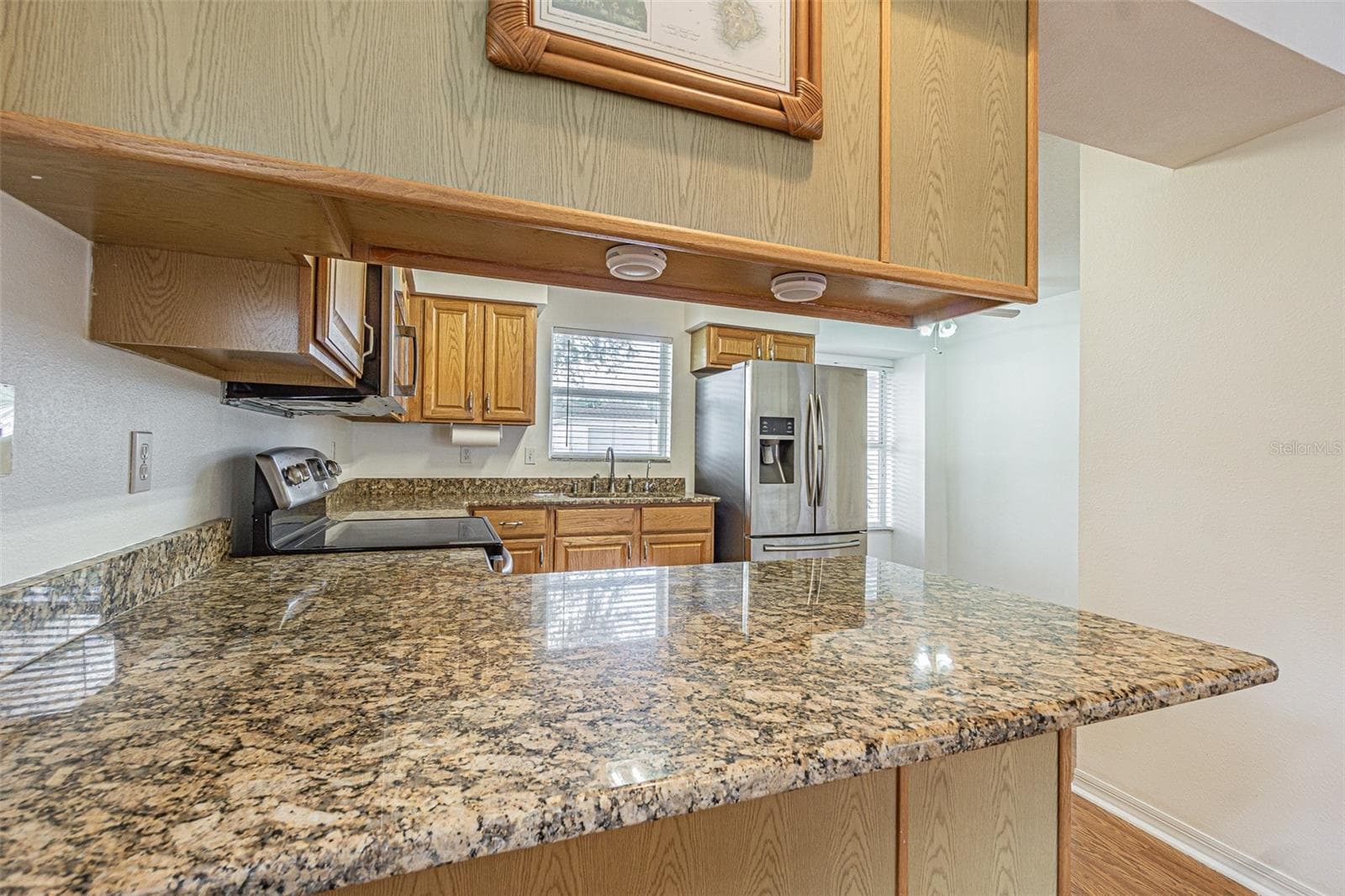 Greanite breakfast bar - 11204 COREY PAVIN LN, SAN ANTONIO