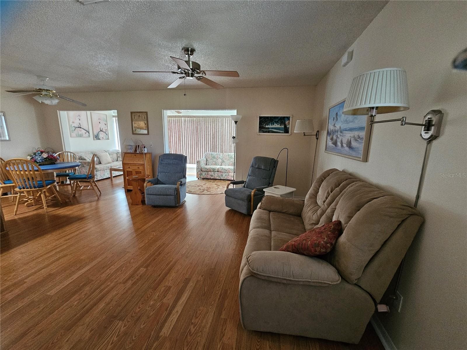 Living room & Dining room - 1905 CANTERBURY LN #E-9, SUN CITY CENTER