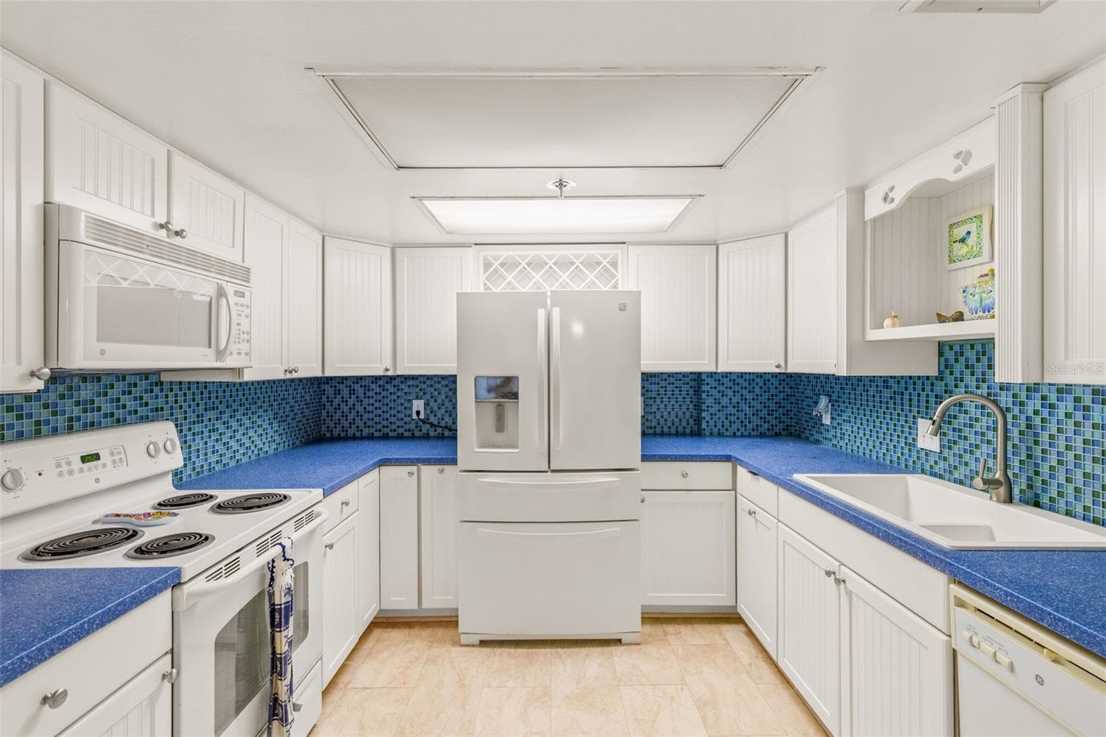 MUCH more functional than original kitchens at key Capri - LOTS of counter space and cabinets... Washer-Dryer here as well - 1 KEY CAPRI #102E, TREASURE ISLAND