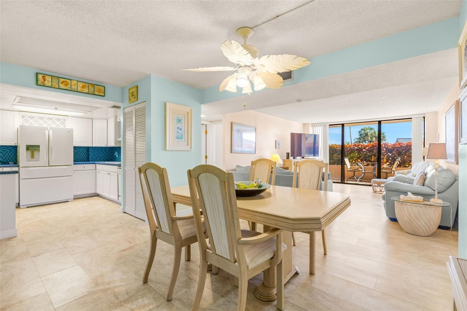 Dining Area is the focal point between the kitchen and Living AreaS (inside AND out!) - 1 KEY CAPRI #102E, TREASURE ISLAND