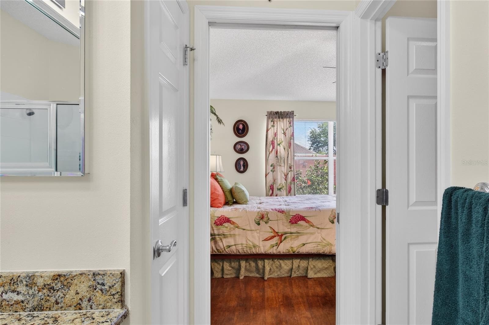 ENTRANCE TO EN SUITE BATH - 1147 ELIZABETH CT, THE VILLAGES