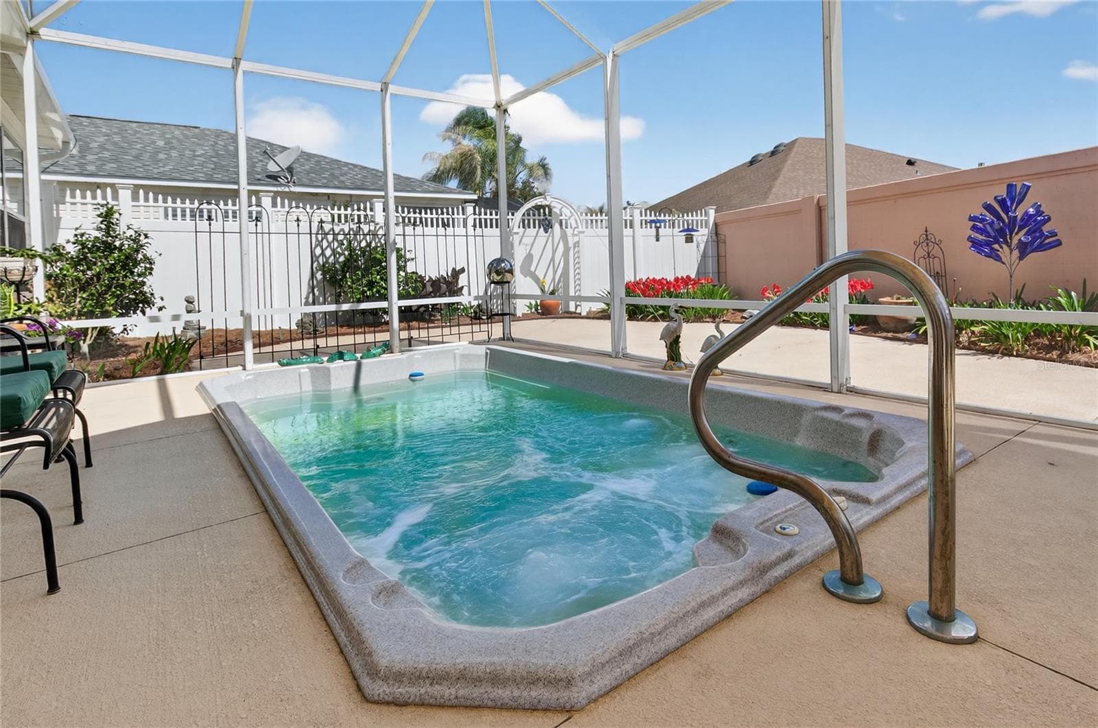 RELAXING JETTED SPA with comfortable seating, perfect for unwinding after a long day. - 1147 ELIZABETH CT, THE VILLAGES