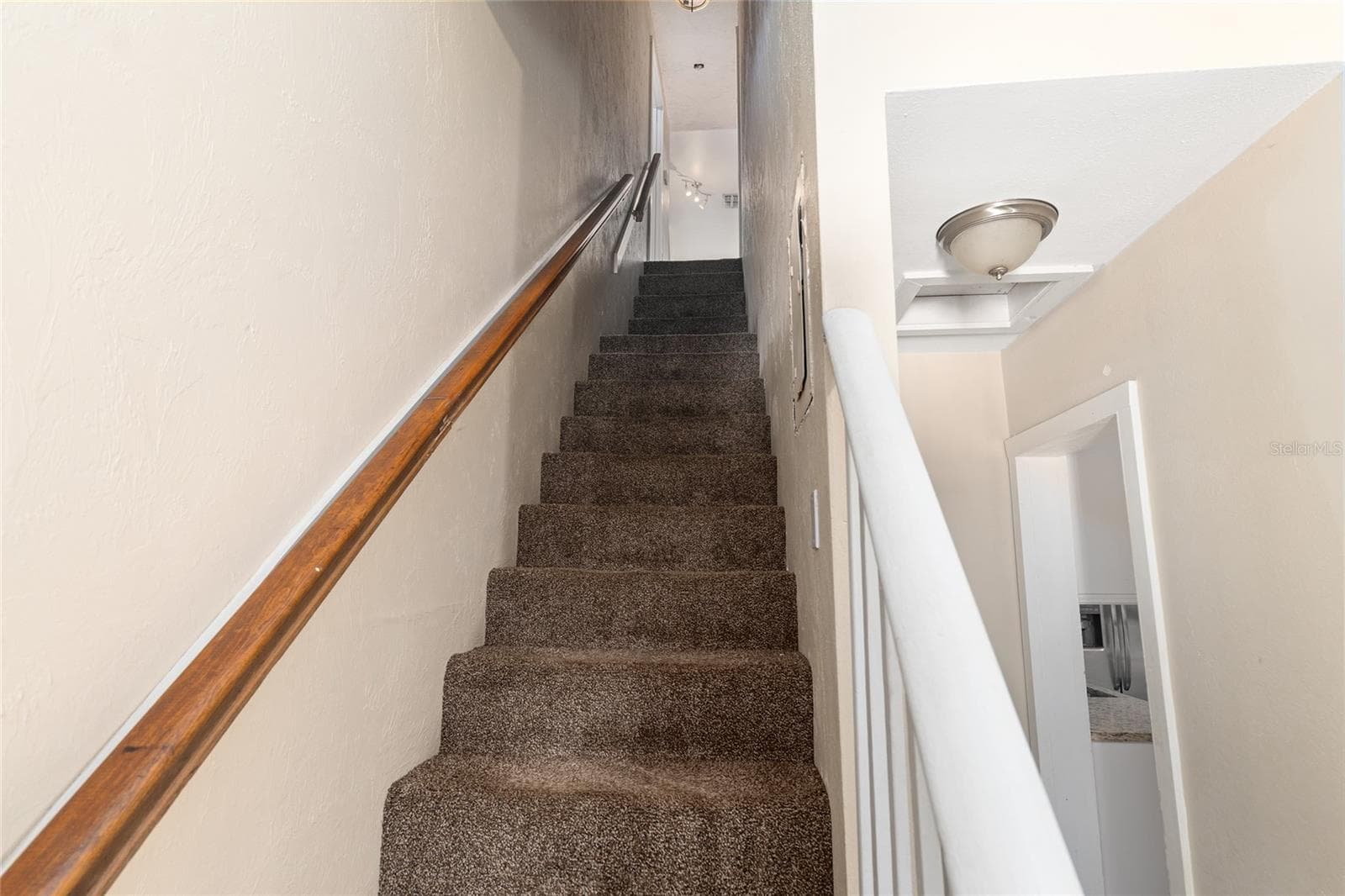 Stairs to second floor. - 721 SE 5TH ST, OCALA