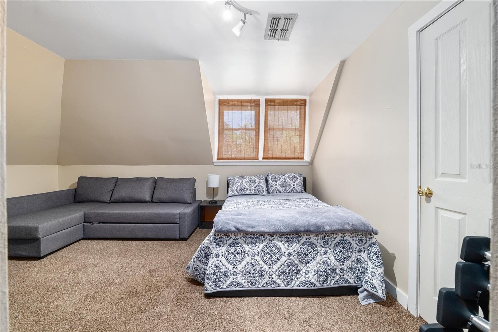 Large bedroom on second floor. - 721 SE 5TH ST, OCALA