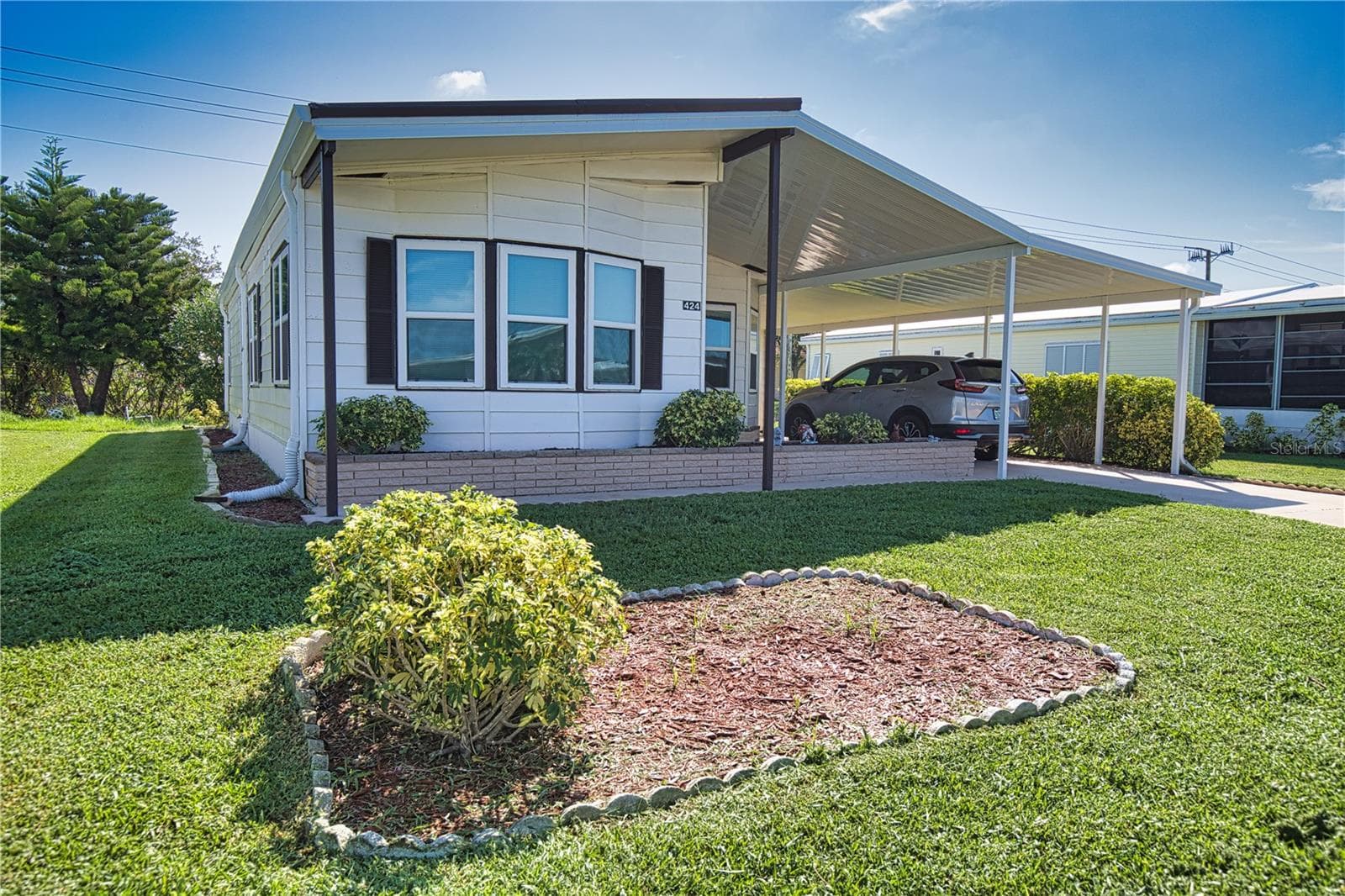Manufactured Home at 424 TARDE LOGO CIR, NORTH PORT, photo 2 of 79