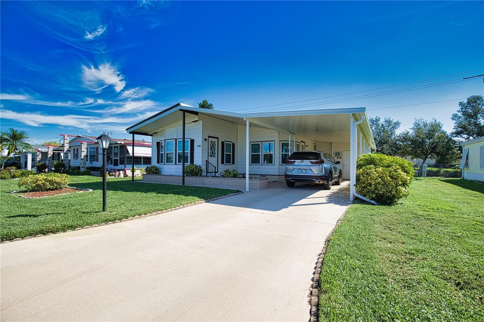 Manufactured Home at 424 TARDE LOGO CIR, NORTH PORT, photo 3 of 79