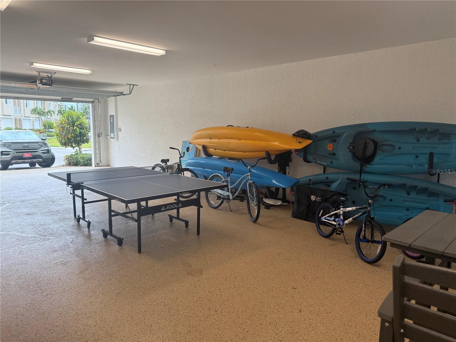 4 Car Garage ping pong table, beach gear - 10420 CORAL LANDINGS LN #115, PLACIDA