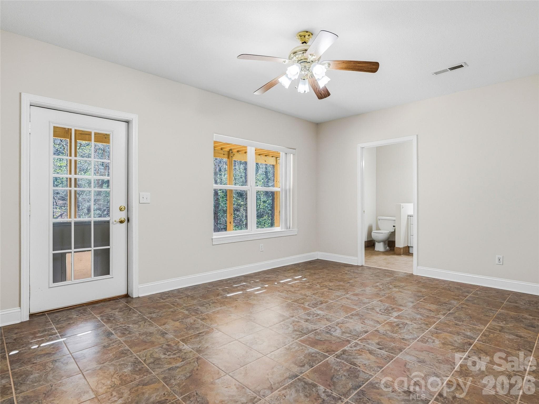 Full Bathroom, Bedroom and Half Bathroom on Basement Level - 196 Blackbird Lane, Tryon
